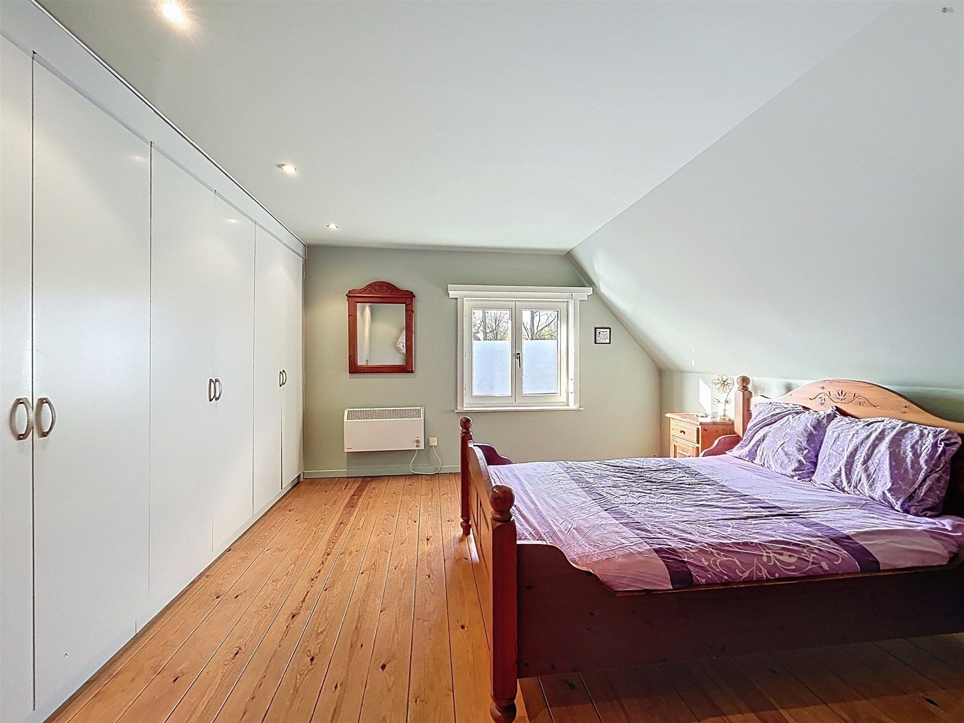 open bebouwing met 2 slaapkamers en garage op perceel van 677m²  foto 8