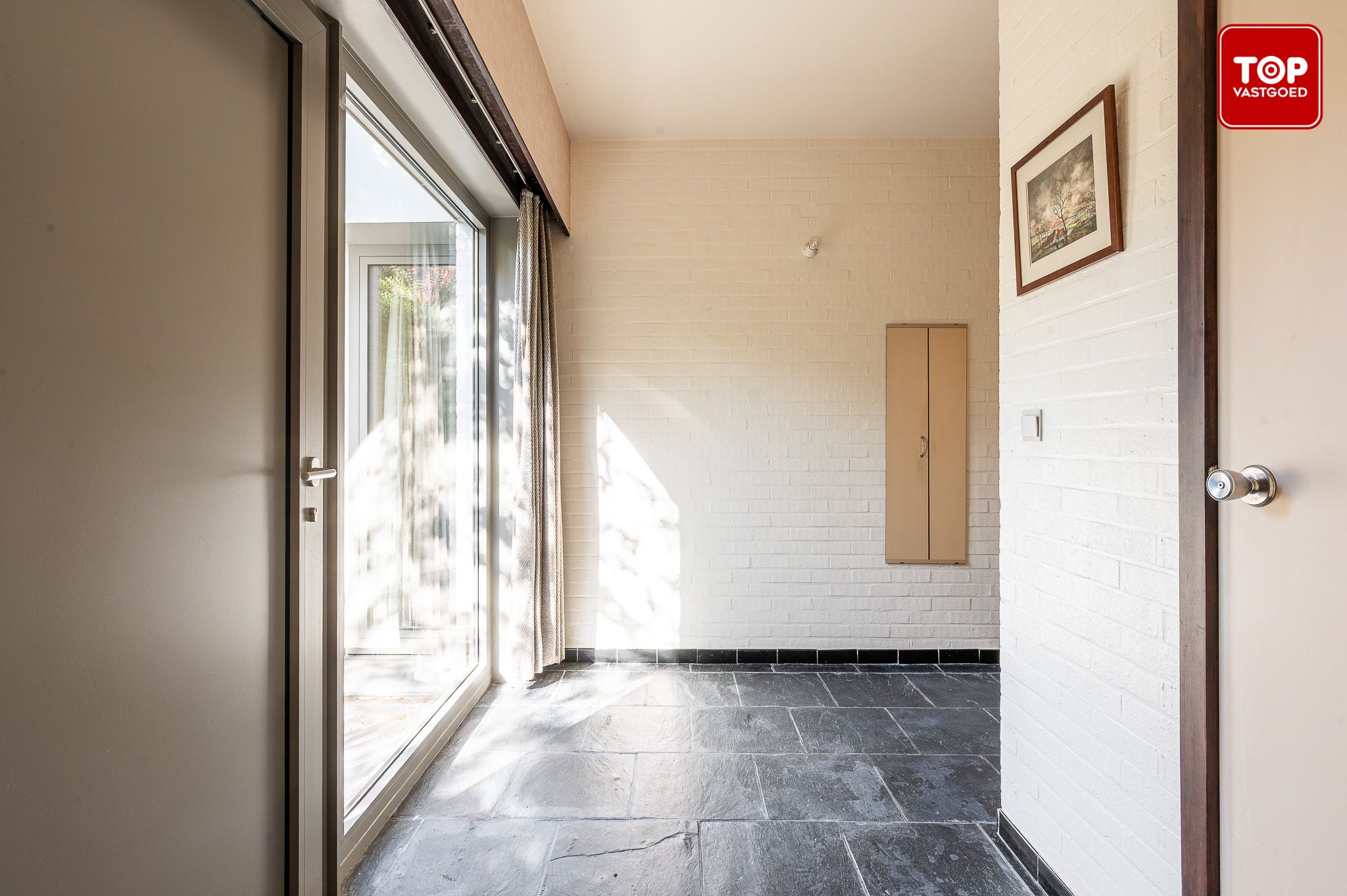 Ruime jaren zeventig villa in Mariakerke-Kolegem foto 4