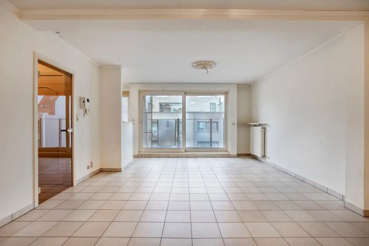 Ruim 2 slaapkamer appartement in het hartje van Koksijde met aankoopmogelijkheid van een garage foto 2