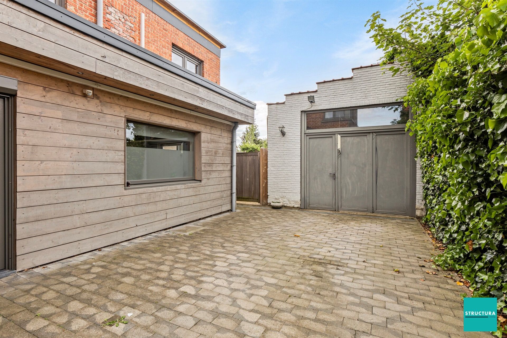 Instapklare woning met 3 ruime slaapkamers, privatieve en aangelegde tuin en grote garage/atelier foto 24