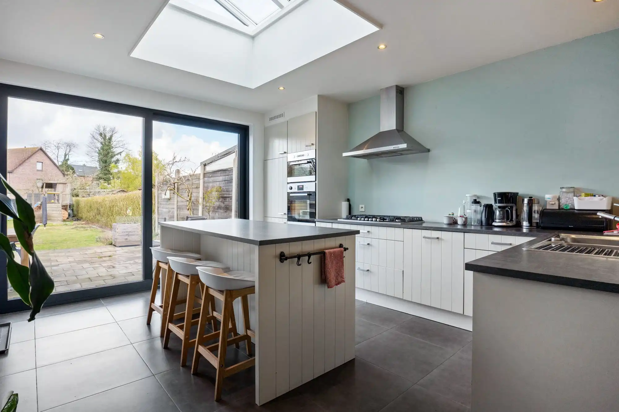 Ruimte, licht en comfort - De ideale gezinswoning met 4 slaapkamers en tuin in Brasschaat! foto 8