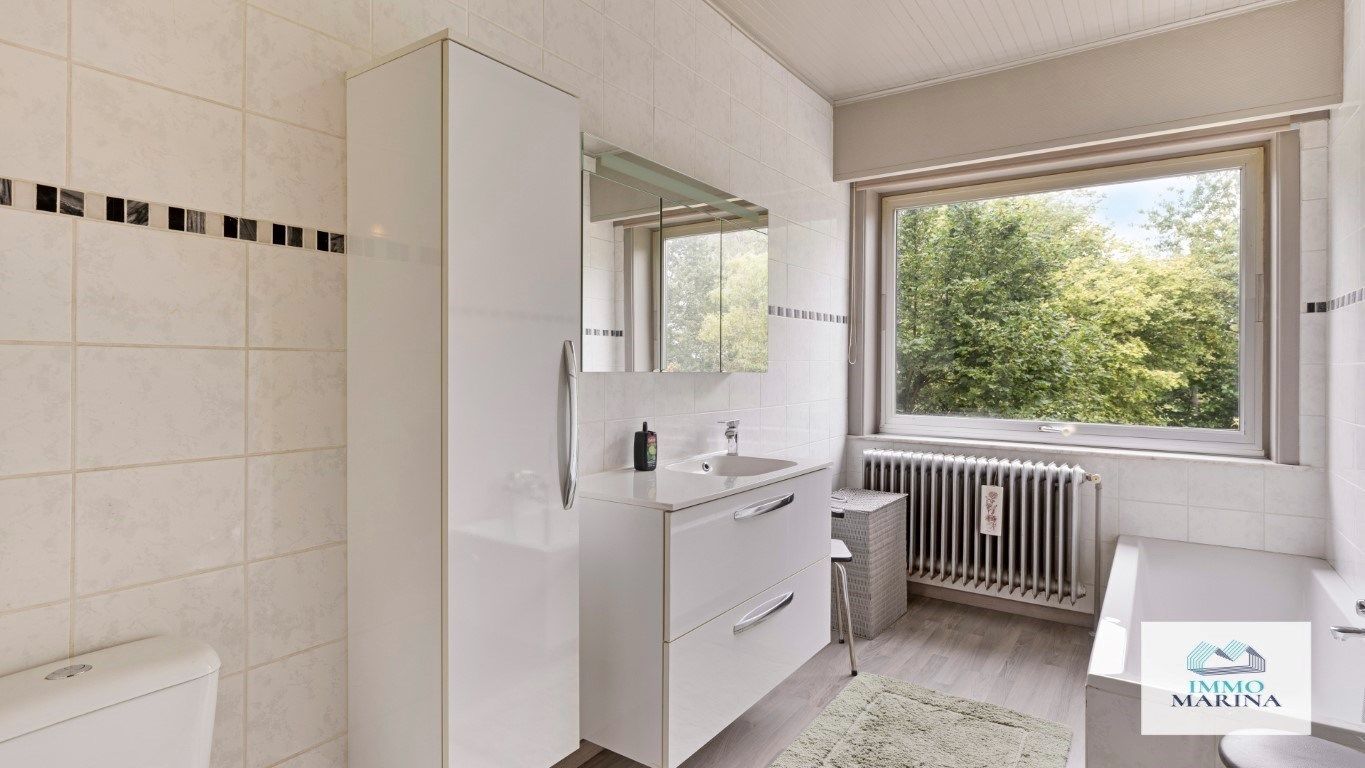 Woning met W-tuin circa 41a en volledige kelder. foto 17
