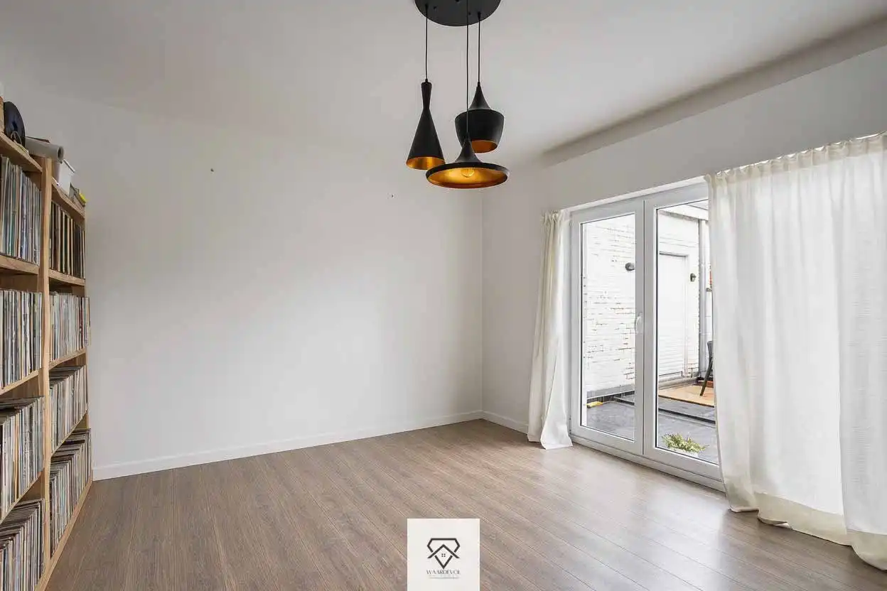 Instapklaar 3-slaapkamerappartement met ruime zolder in centrum Drongen foto 18