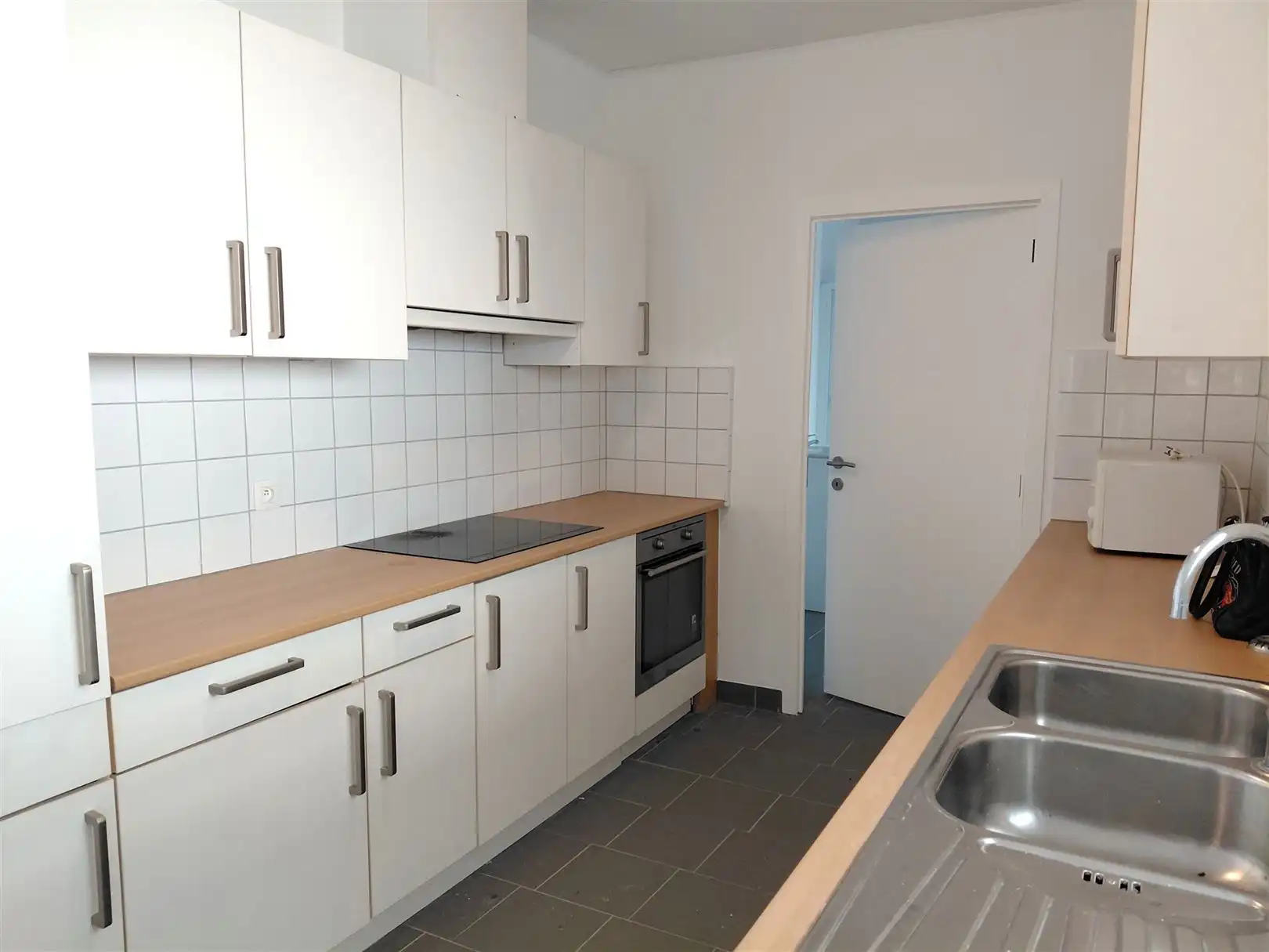 TE HUUR: Gesloten bebouwing met 2 slaapkamers in het centrum van Heusden! foto 7