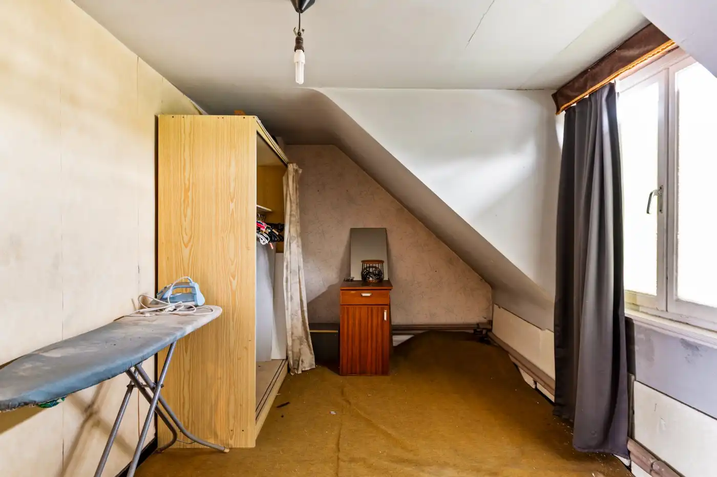 Te renoveren woning met 3 slpk., stadstuin en garage foto 18