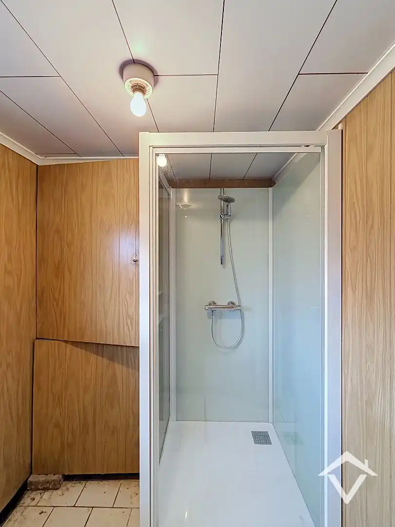 Alleenstaande woning met twee slaapkamers, tuin en garage te Roeselare foto 7