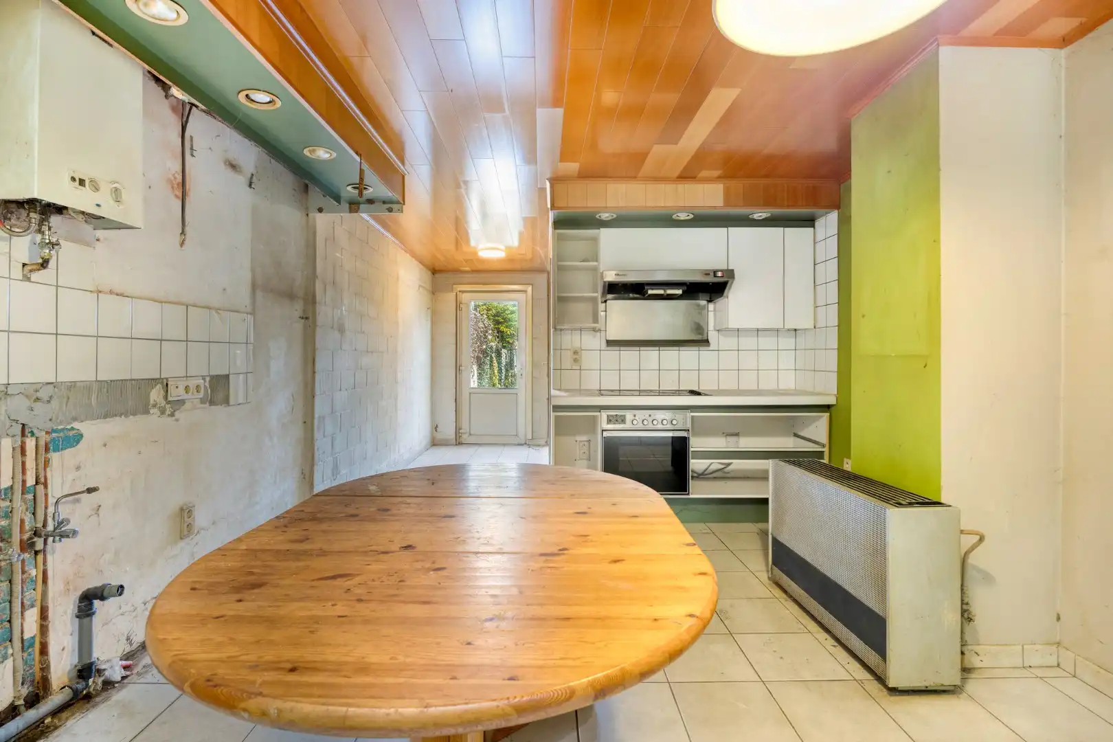 Te renoveren woning langs het centrum van Mol !  foto 8