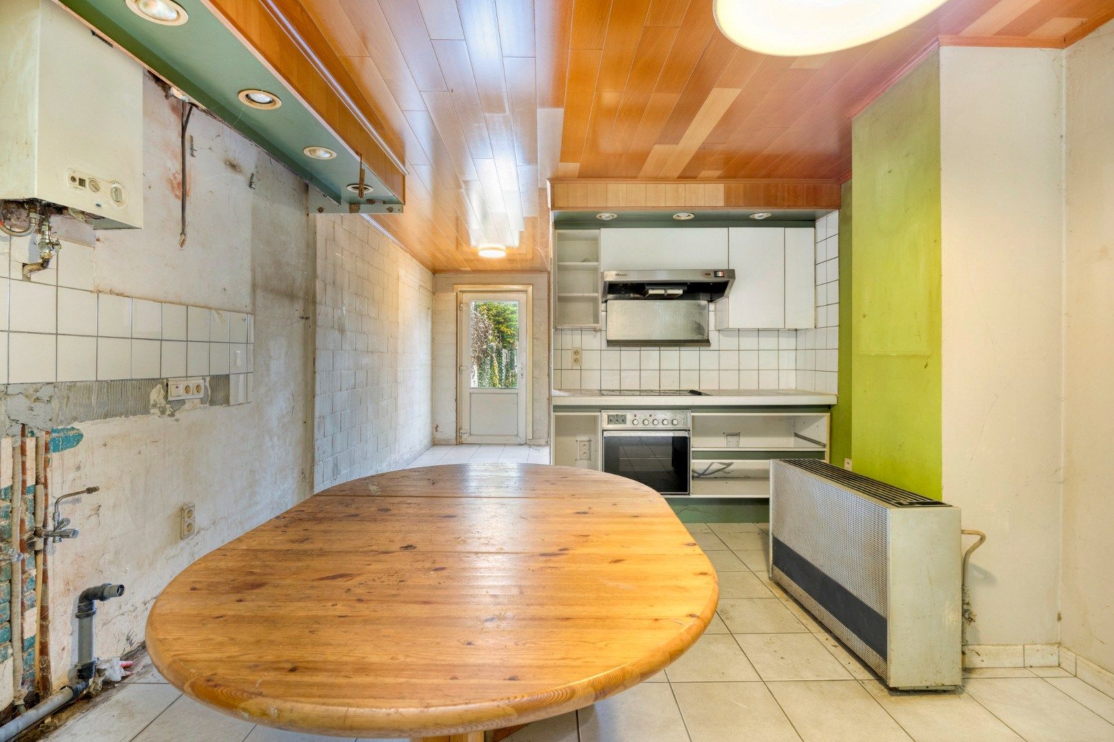 Te renoveren woning langs het centrum van Mol !  foto 8