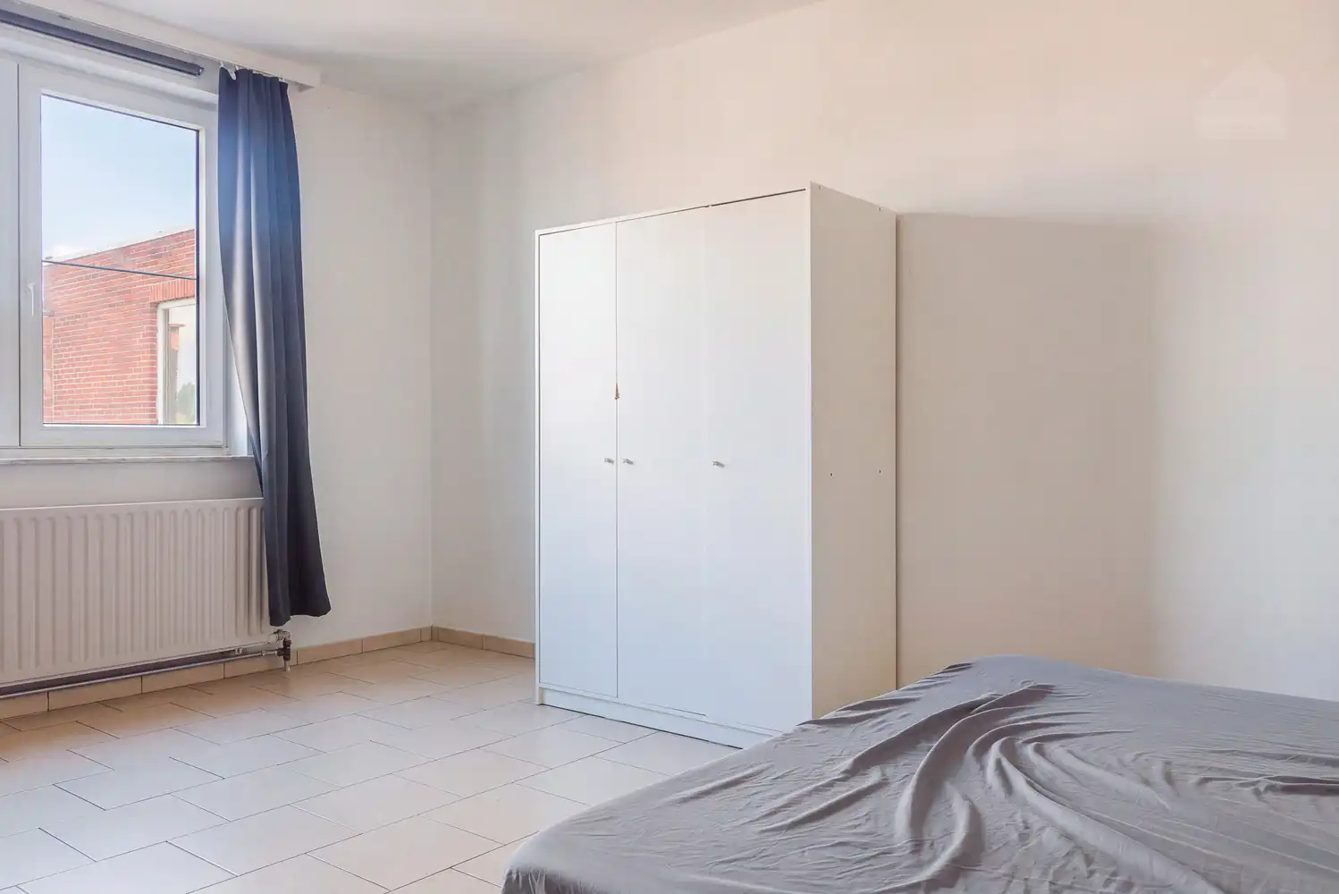 Ruim en instapklaar appartement met 2 slaapkamers, garage en centrale ligging in Tessenderlo foto 9