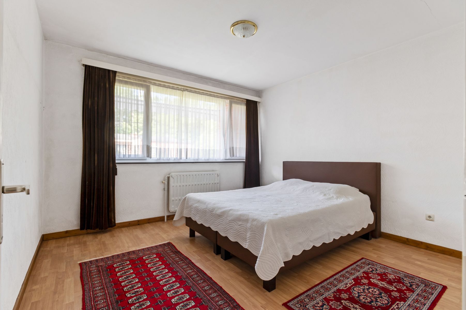 Unieke kans: appartement met tuin, garagebox en berging foto 7