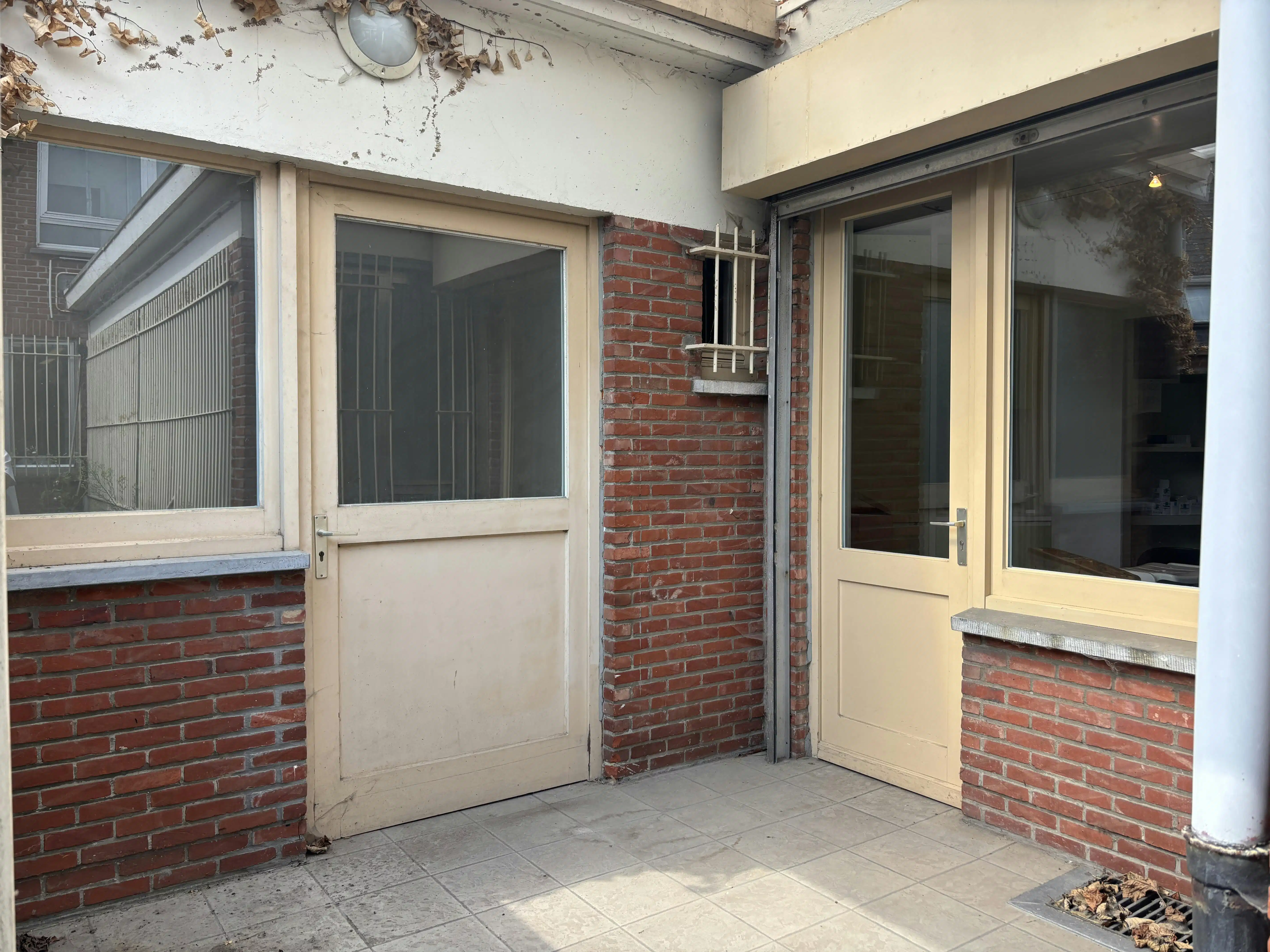 Handelspand met woonst te koop in centrum Brecht! foto 9