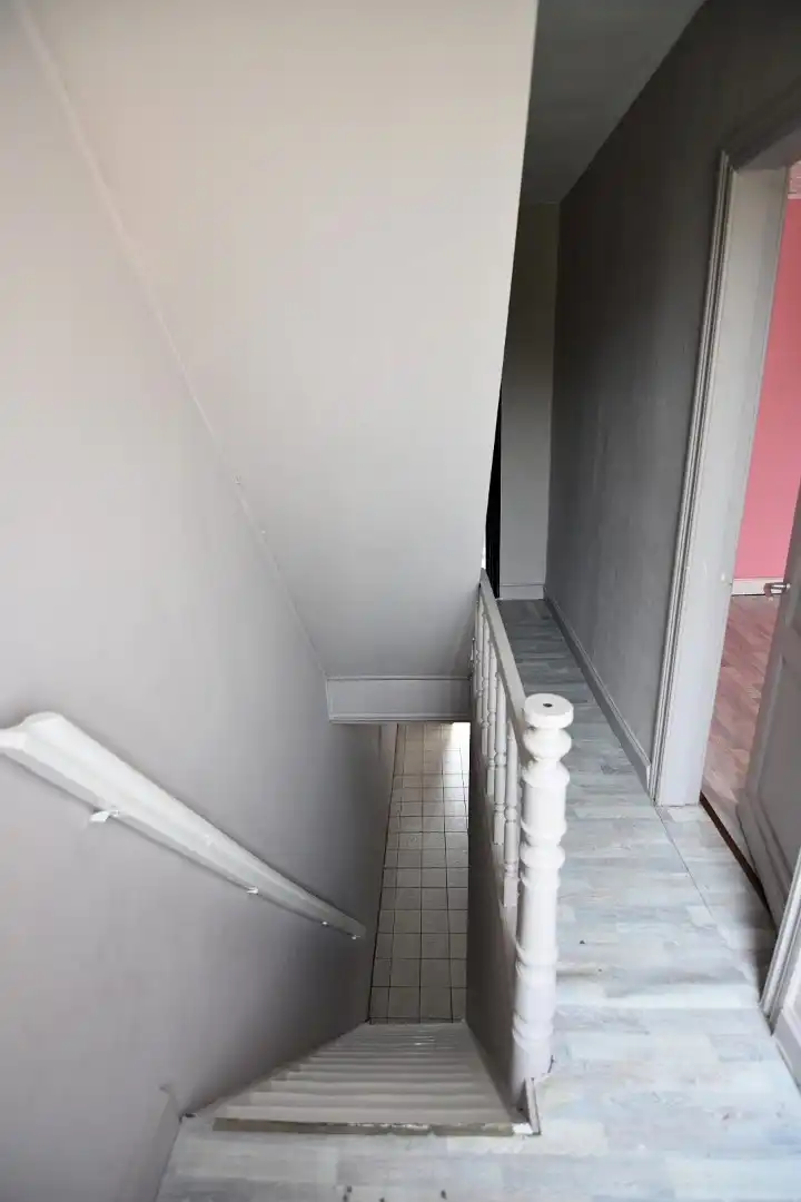 Te renoveren rijwoning met goeie ligging foto 15