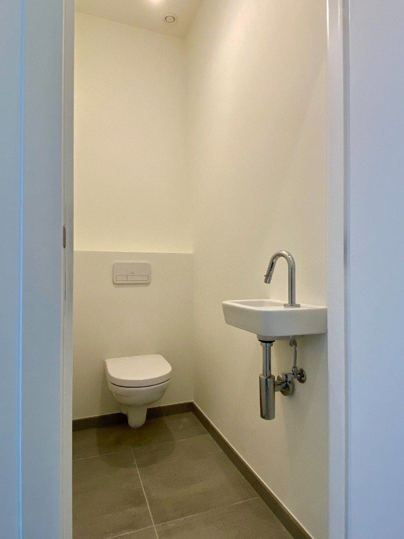 Nieuwbouw appartement in centrum Kortrijk met tuin/terras en 1 slaapkamer foto 7