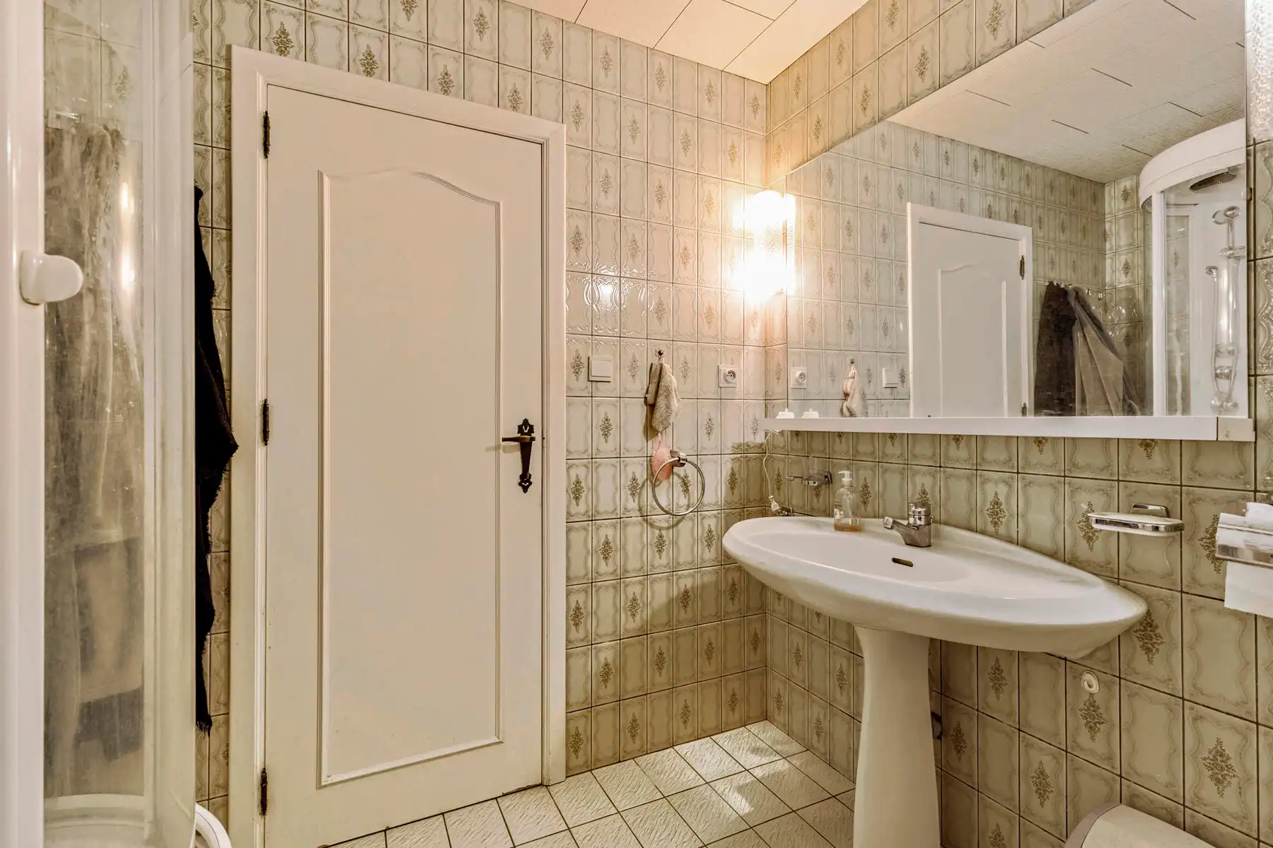 In de dorpskern van Neeroeteren gelegen halfvrijstaande woning met 2 slaapkamers. foto 17