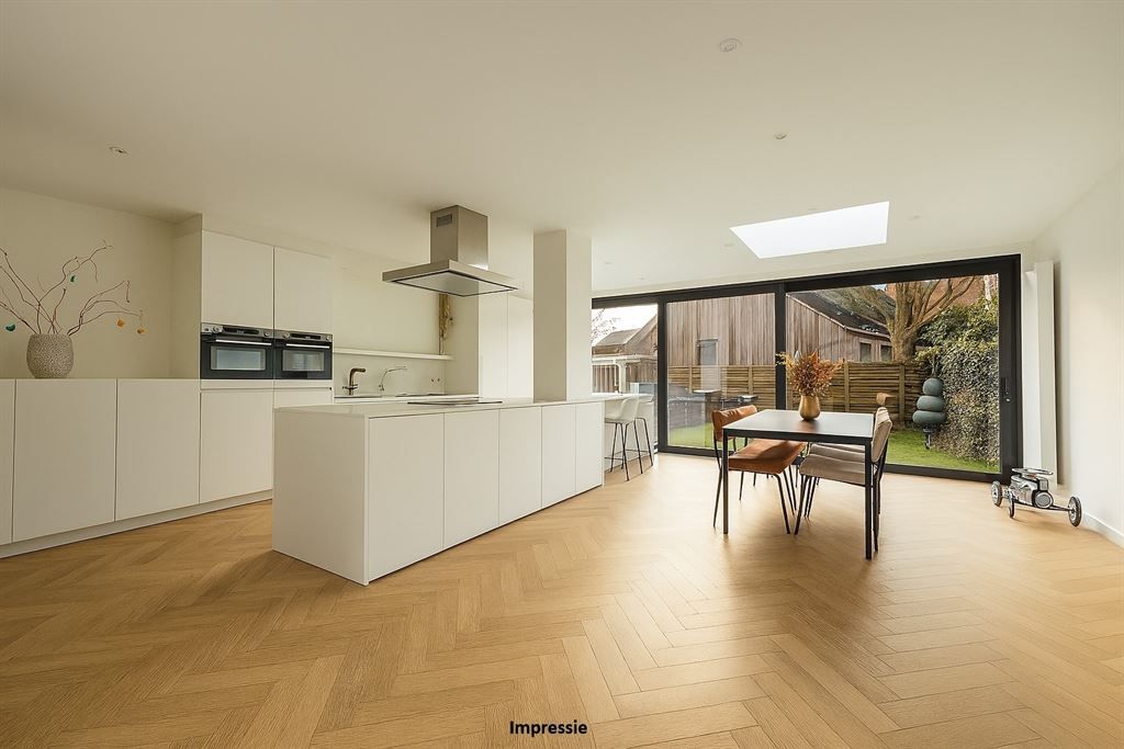 Ruime energiezuinige woning met tuin en garage foto 3