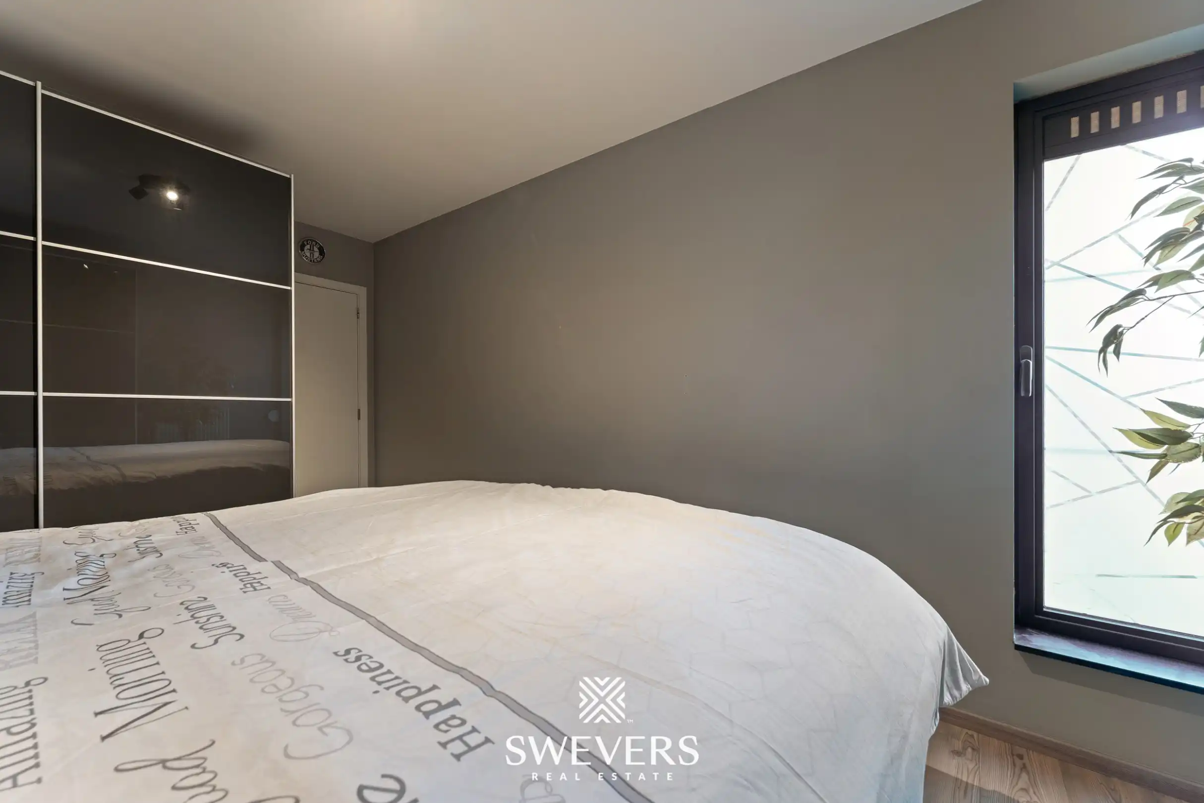 Ruim instapklaar appartement met 3 slaapkamers, zonnig terras en ondergrondse parking te Genk (EPC: A) foto 12