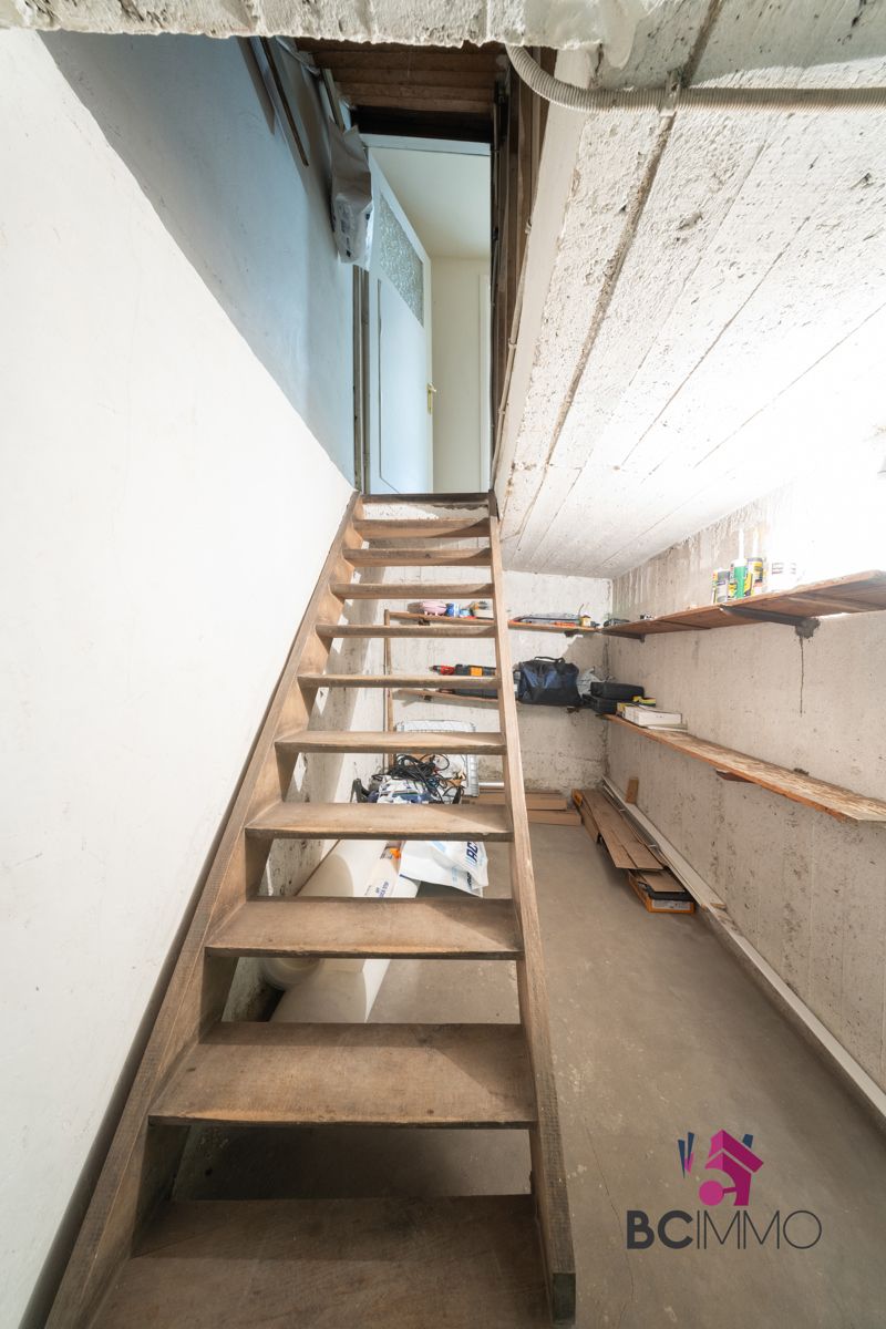 Karaktervolle woning met ruime tuin te Genk foto 16