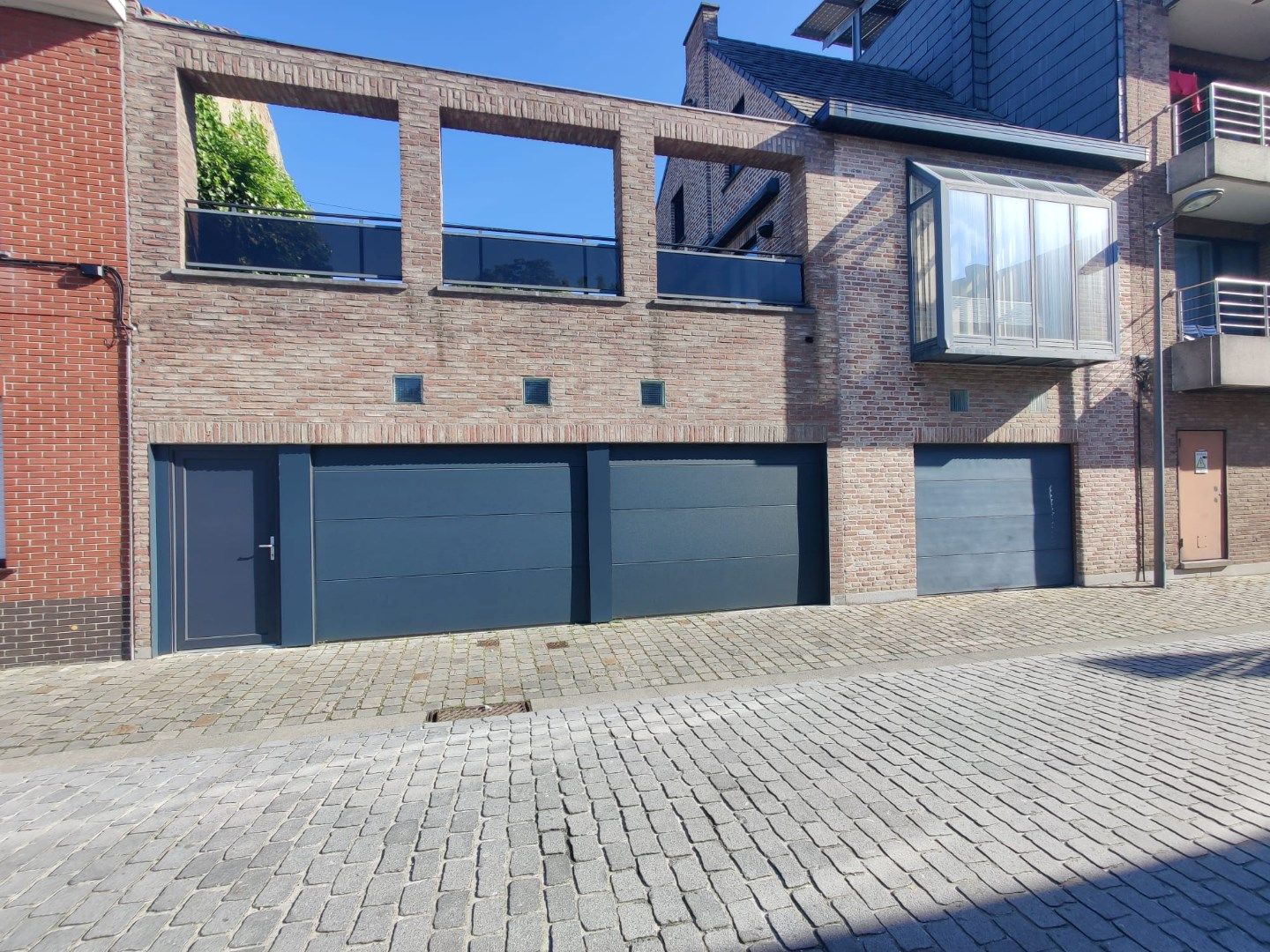 Opbrengsteigendom: 7 appartementen met 3 garages. foto 24