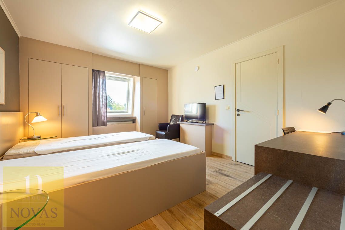 Authentiek handelspand / hotel met restaurant, feestzaal en mooie tuin op ideale locatie. foto 21