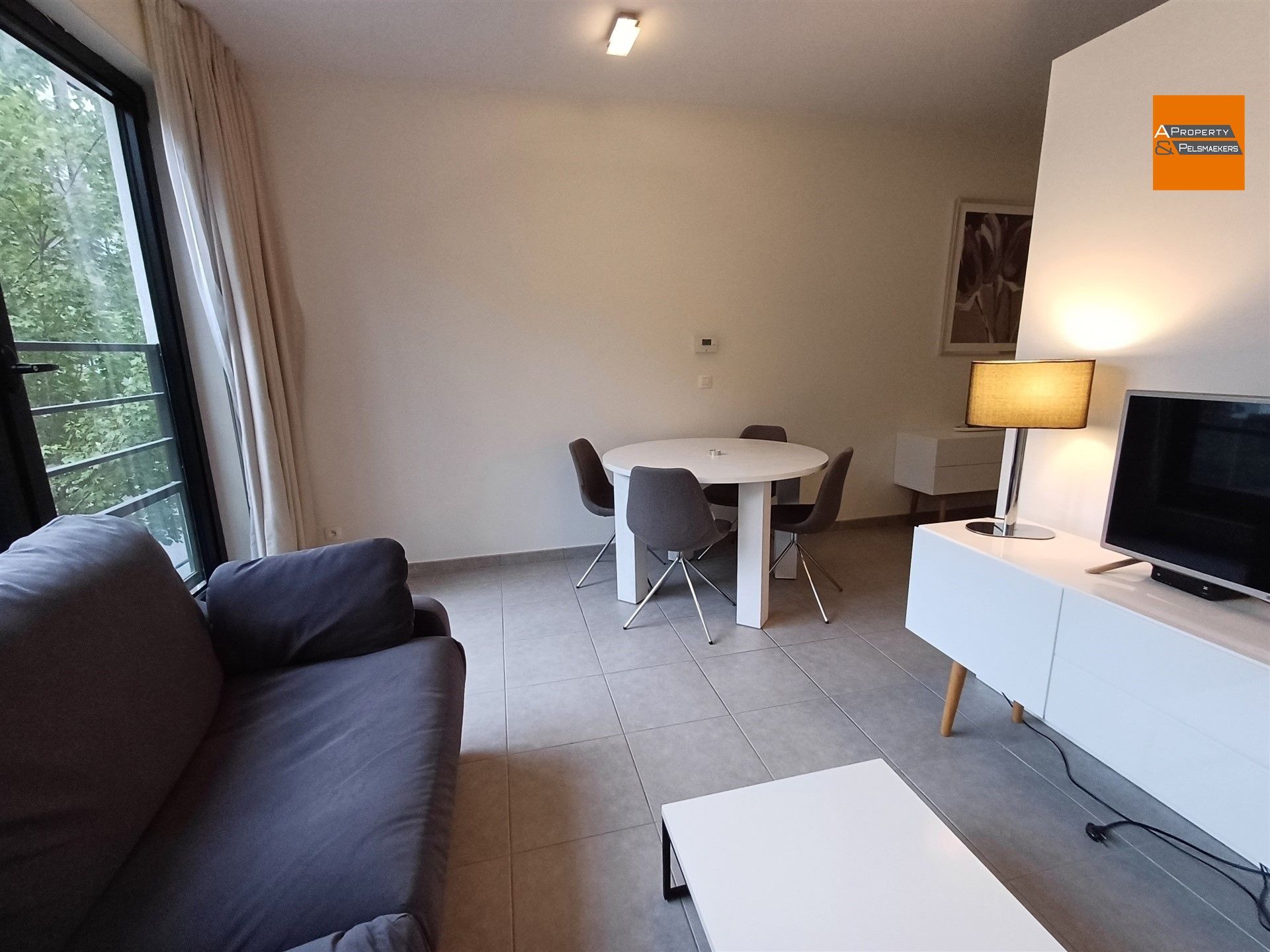 Ruime gemeubileerde studio met parkeerplaats en kelder foto 14