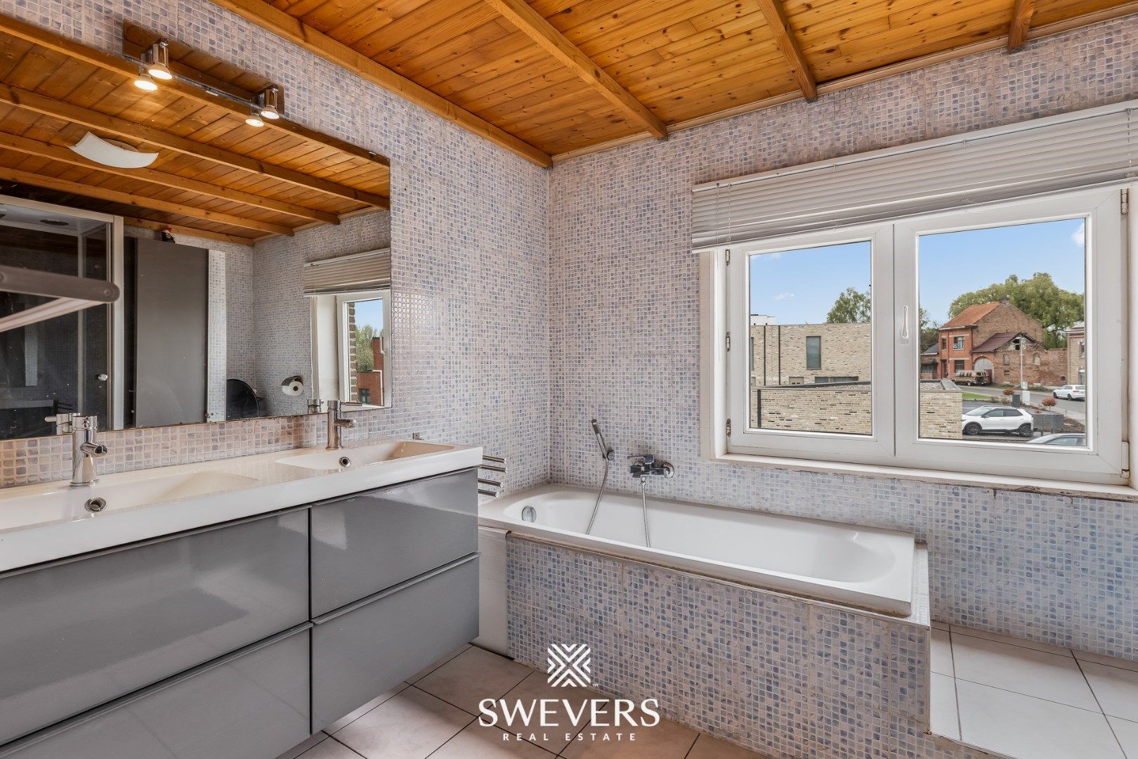 Gezellige woning met veranda, garage & zonnige tuin foto 11