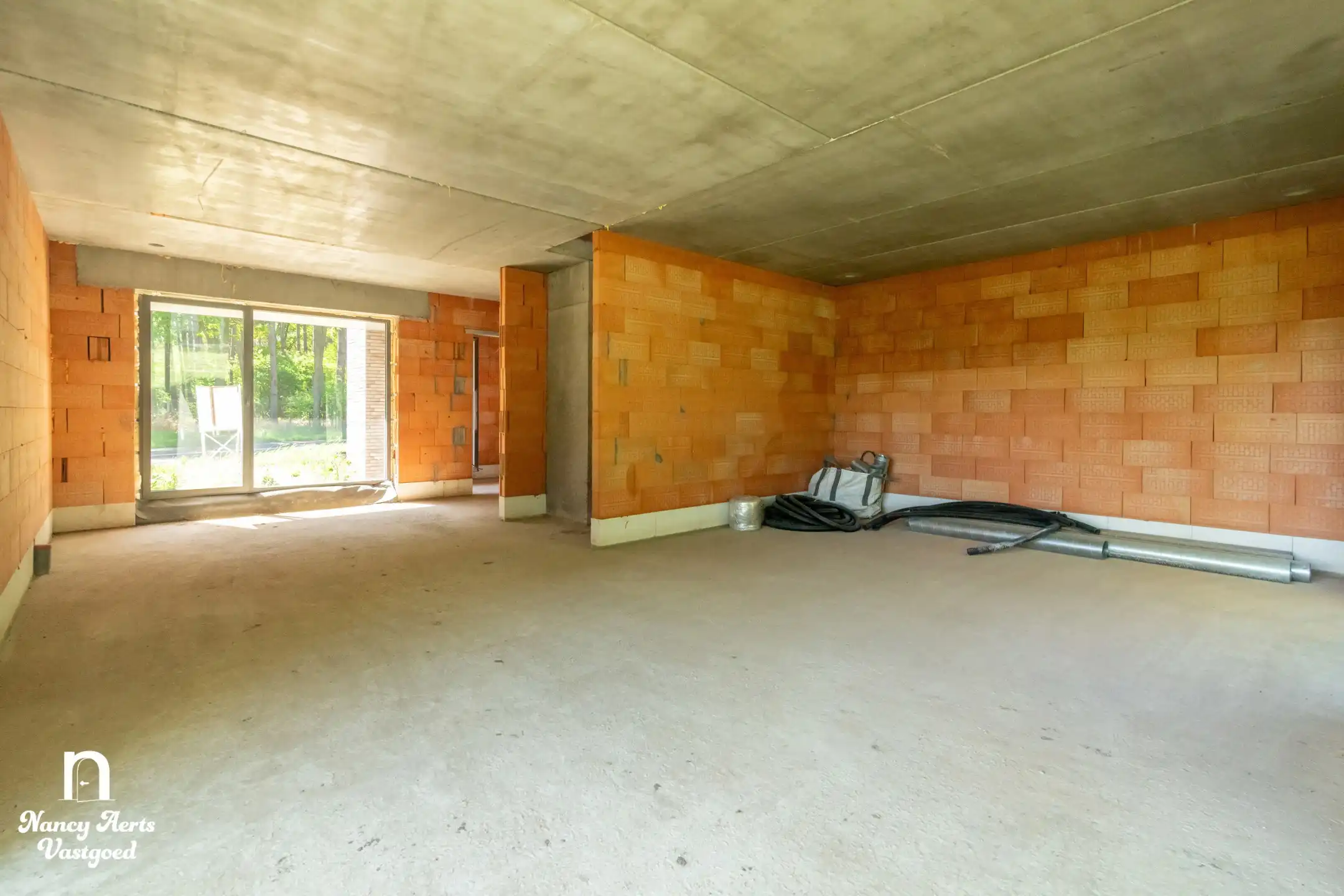 Moderne gezinswoning met tuin en afwerking naar eigen smaak foto 3