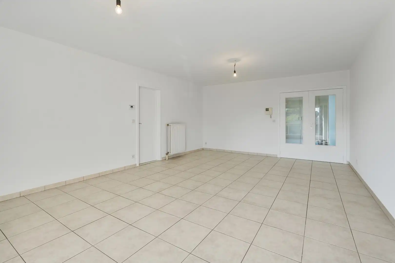 Instapklaar appartement met garagebox aan de markt van Olsene foto 8