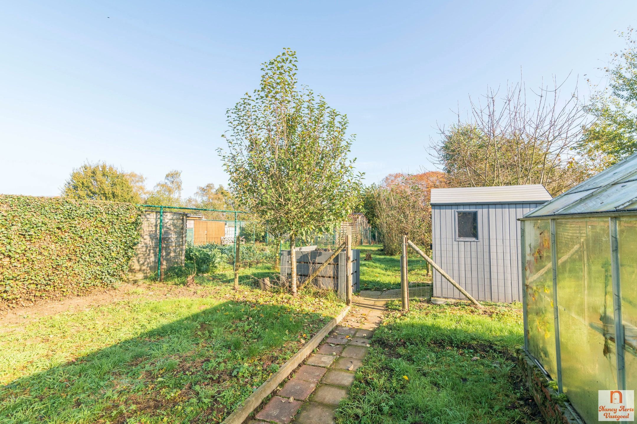 Sfeervolle gezinswoning met zonnige tuin in Paal foto 33