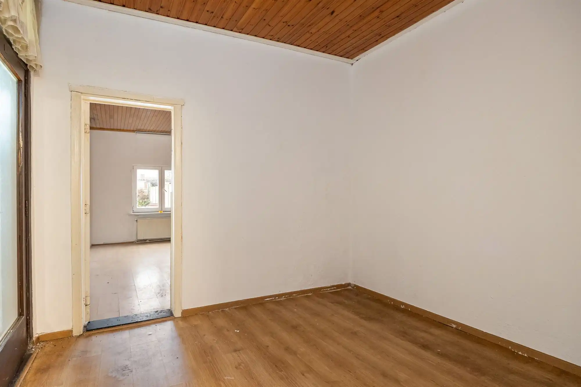 Te renoveren ééngezinswoning met 3 slpkrs, tuin en garage foto 7