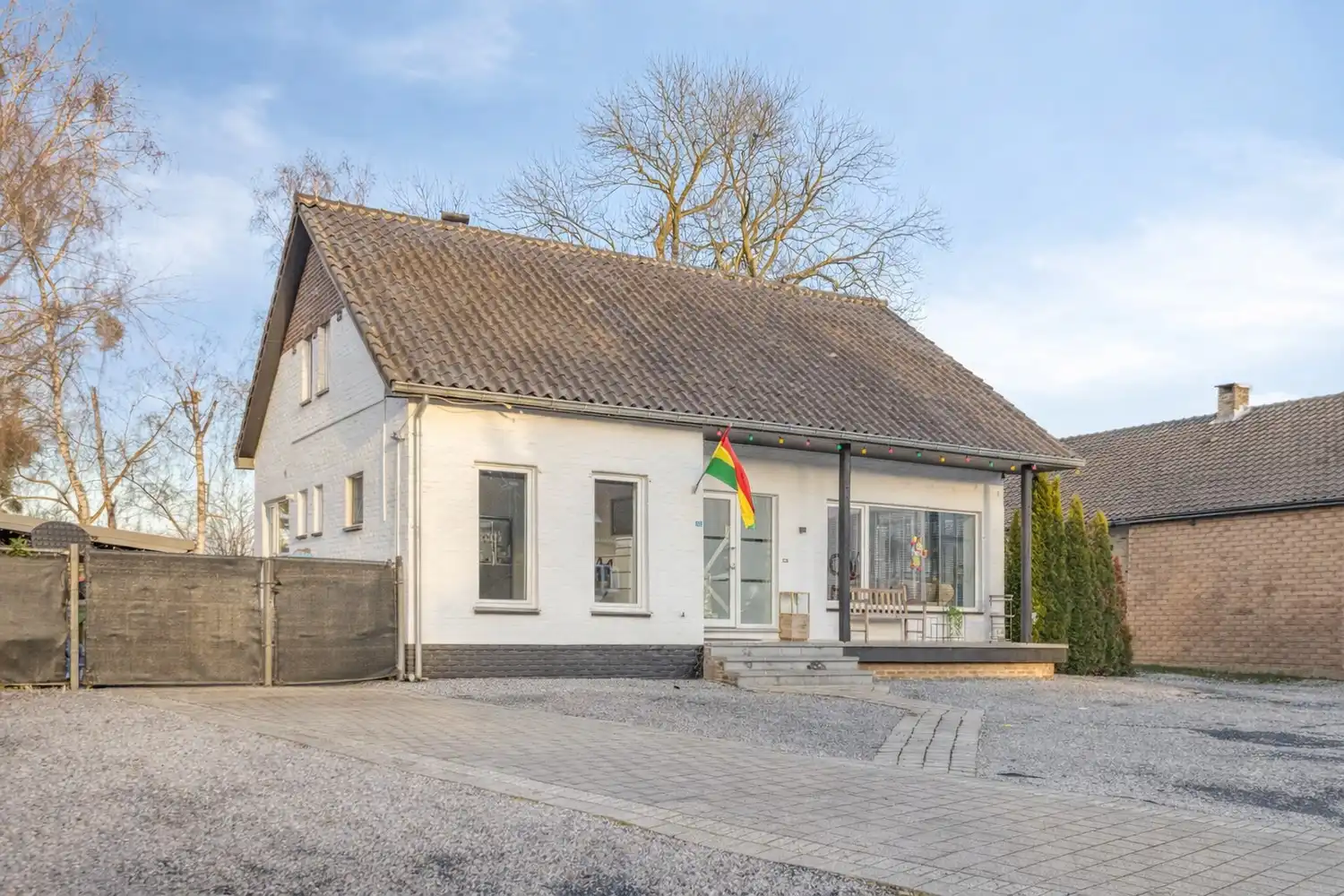 Charmante split-level woning met 3 slaapkamers en ruime tuin in Kotem, Maasmechelen. foto 2