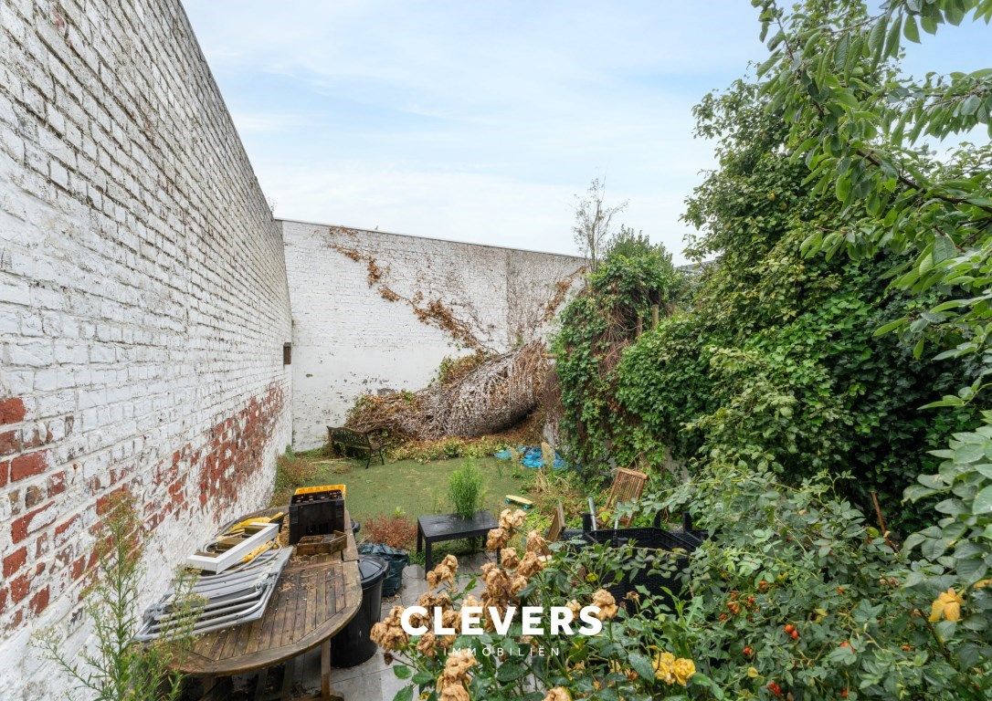 Te renoveren rijwoning met veel potentieel en grote tuin foto 8