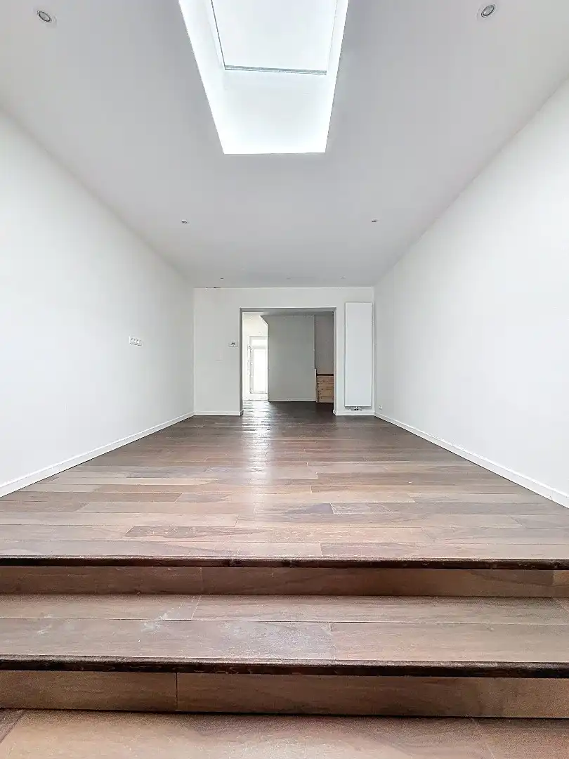 Elegant wonen in Tienen: gerenoveerde rijwoning met 3 slaapkamers en zuidwestgerichte tuin. foto 7