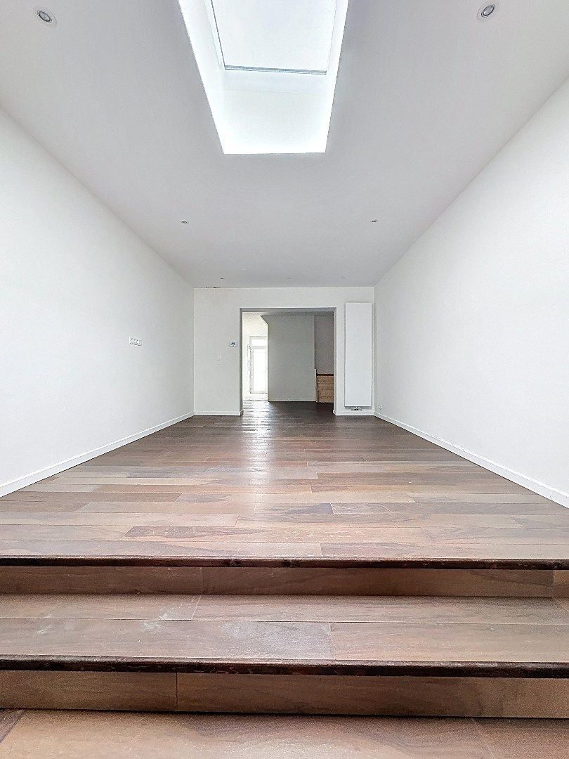 Elegant wonen in Tienen: gerenoveerde rijwoning met 3 slaapkamers en zuidwestgerichte tuin. foto 7