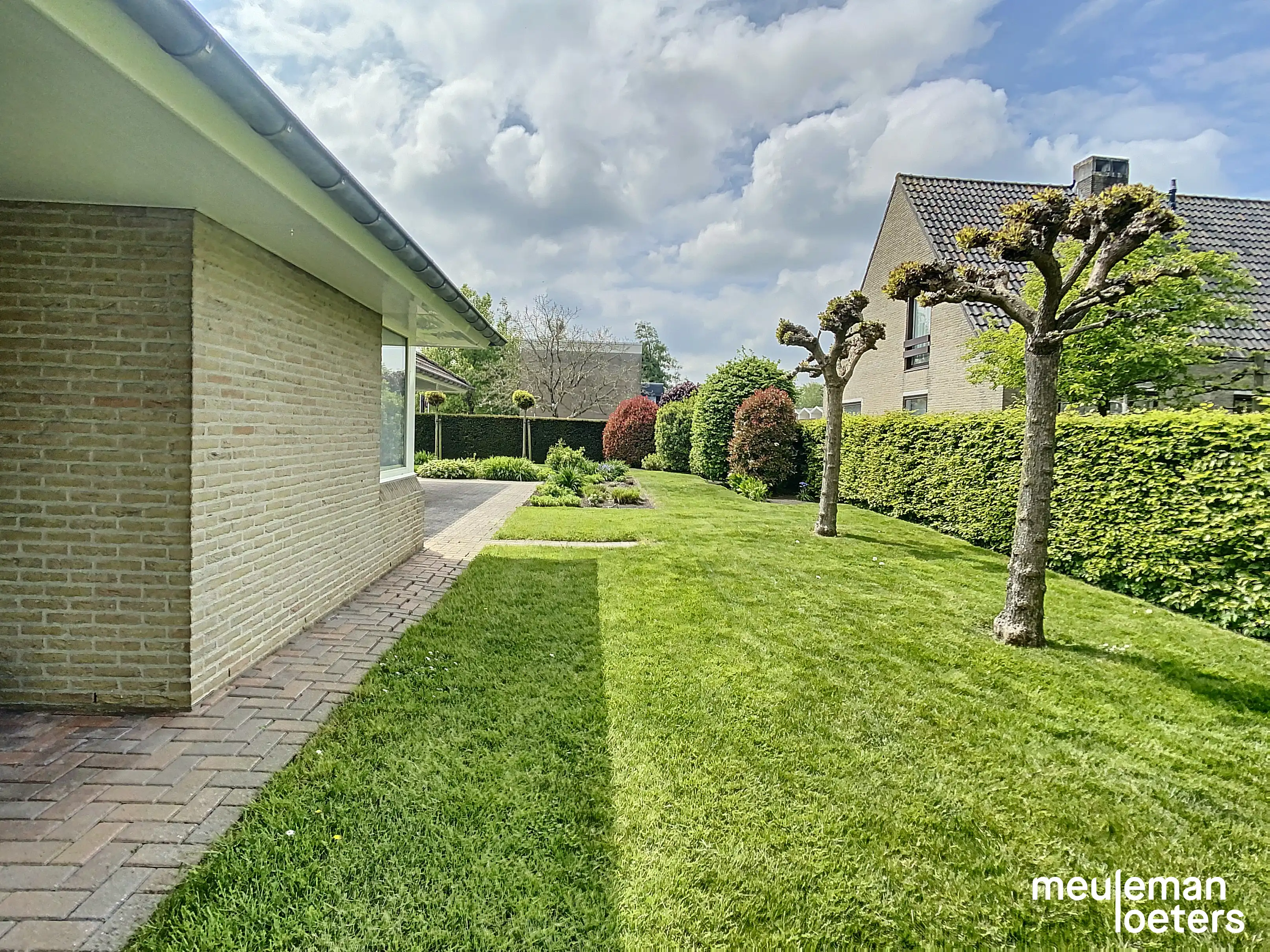Schitterend gelegen en energiezuinige gelijkvloerse woning met tuin en garage foto 17