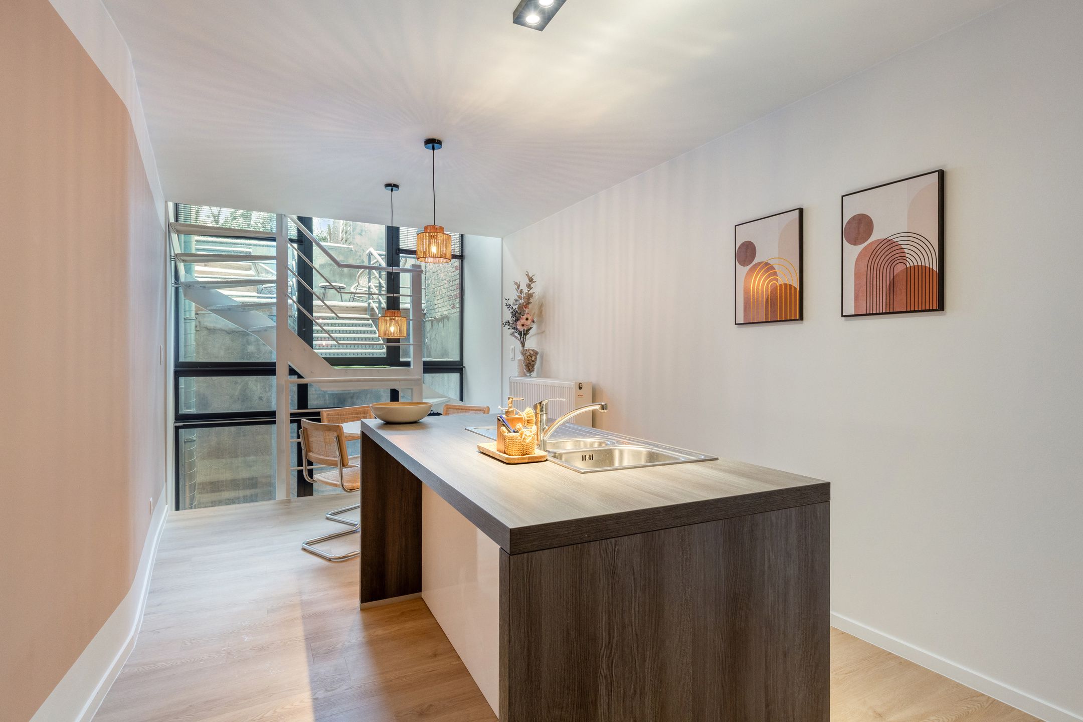 Instapklaar triplex appartement met terras en tuin foto 2