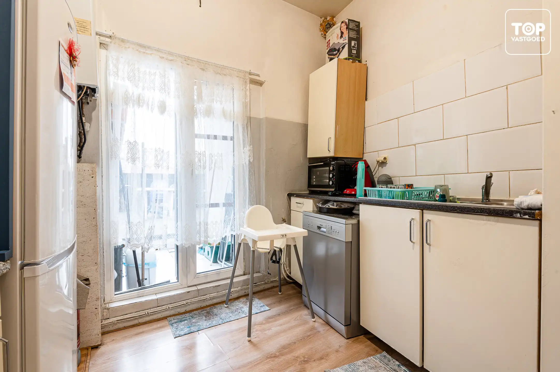 DISCREET Centraal gelegen (opbrengst) eigendom met verhuurd handelsgelijkvloers en 2-slaapkamer woonst foto 14