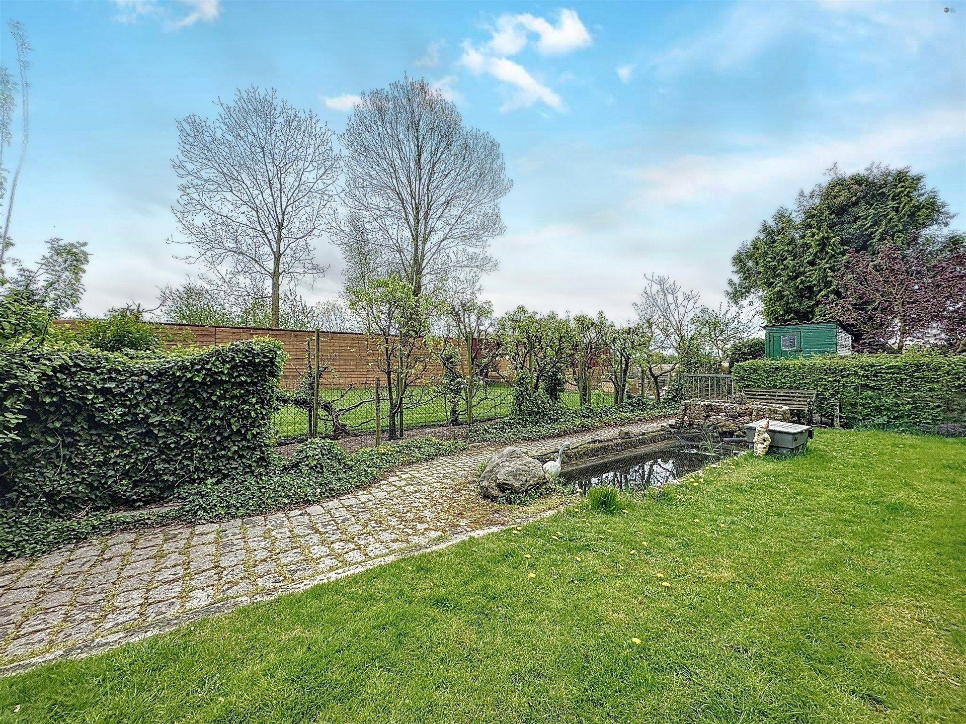 Prachtige open bebouwing met 4 slaapkamers en garage op perceel van 946m² foto 25