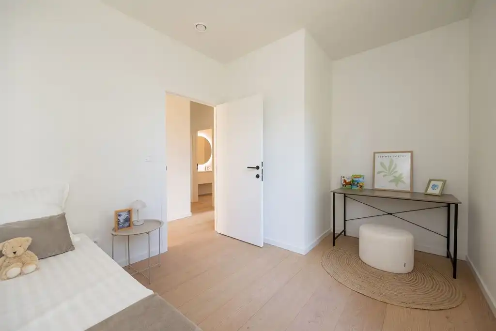 Luxueus gelijkvloers app met ruime tuin foto 18