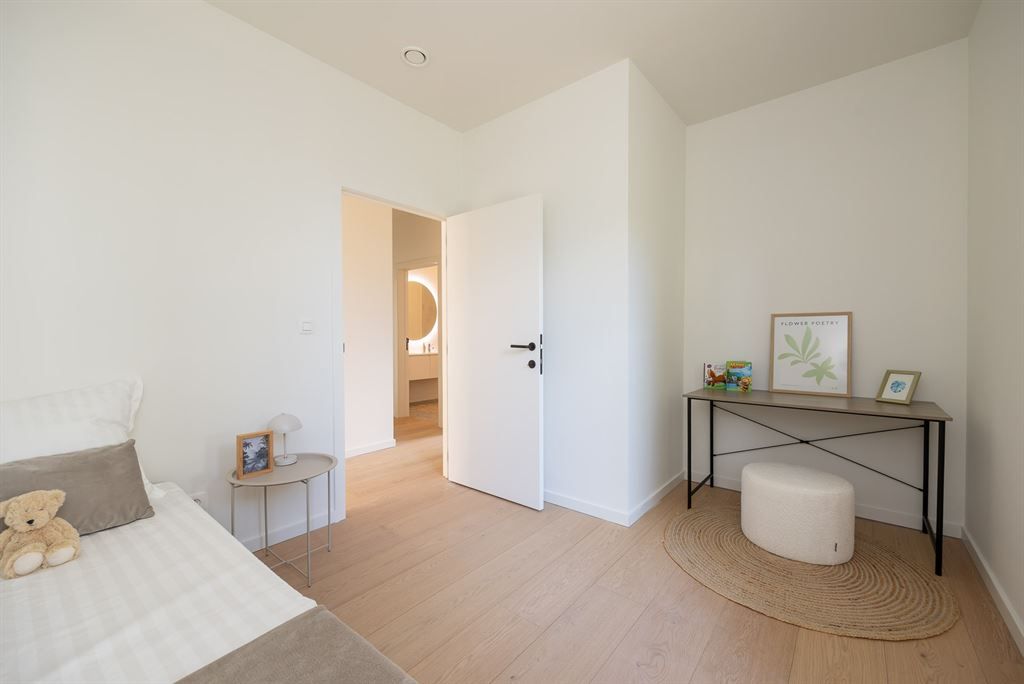 Luxueus gelijkvloers app met ruime tuin foto 18