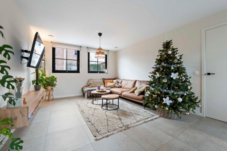 PRACHTIG NIEUWBOUWAPPARTEMENT MET 2 SLKS EN EEN STAANPLAATS IN HET LANDELIJKE HEERS foto 5