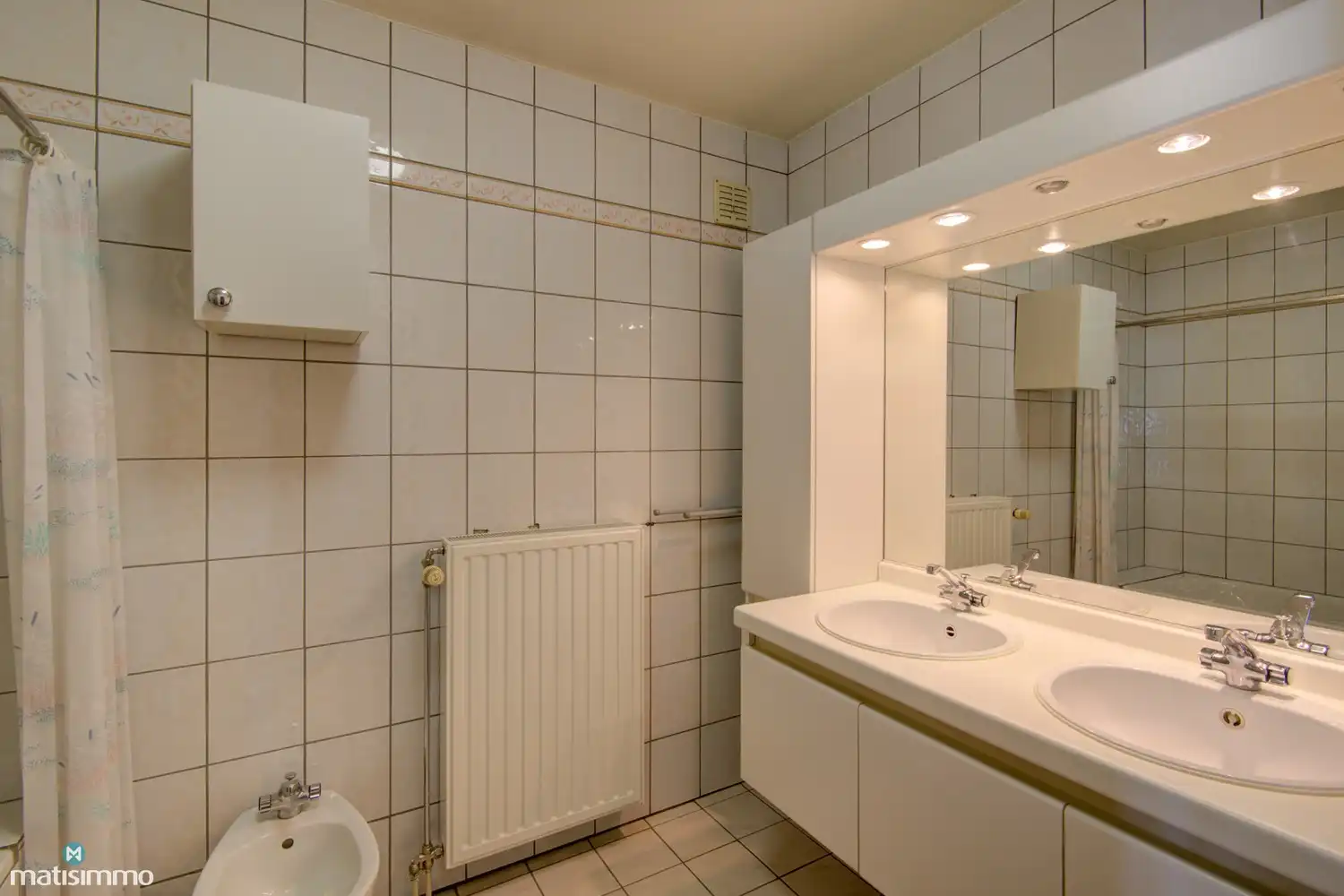 RUIM APPARTEMENT MET 2 SLAAPKAMERS, 2 TERRASSEN, KELDERBERGING EN ONDERGRONDSE AUTOSTAANPLAATS IN BILZEN-CENTRUM foto 8