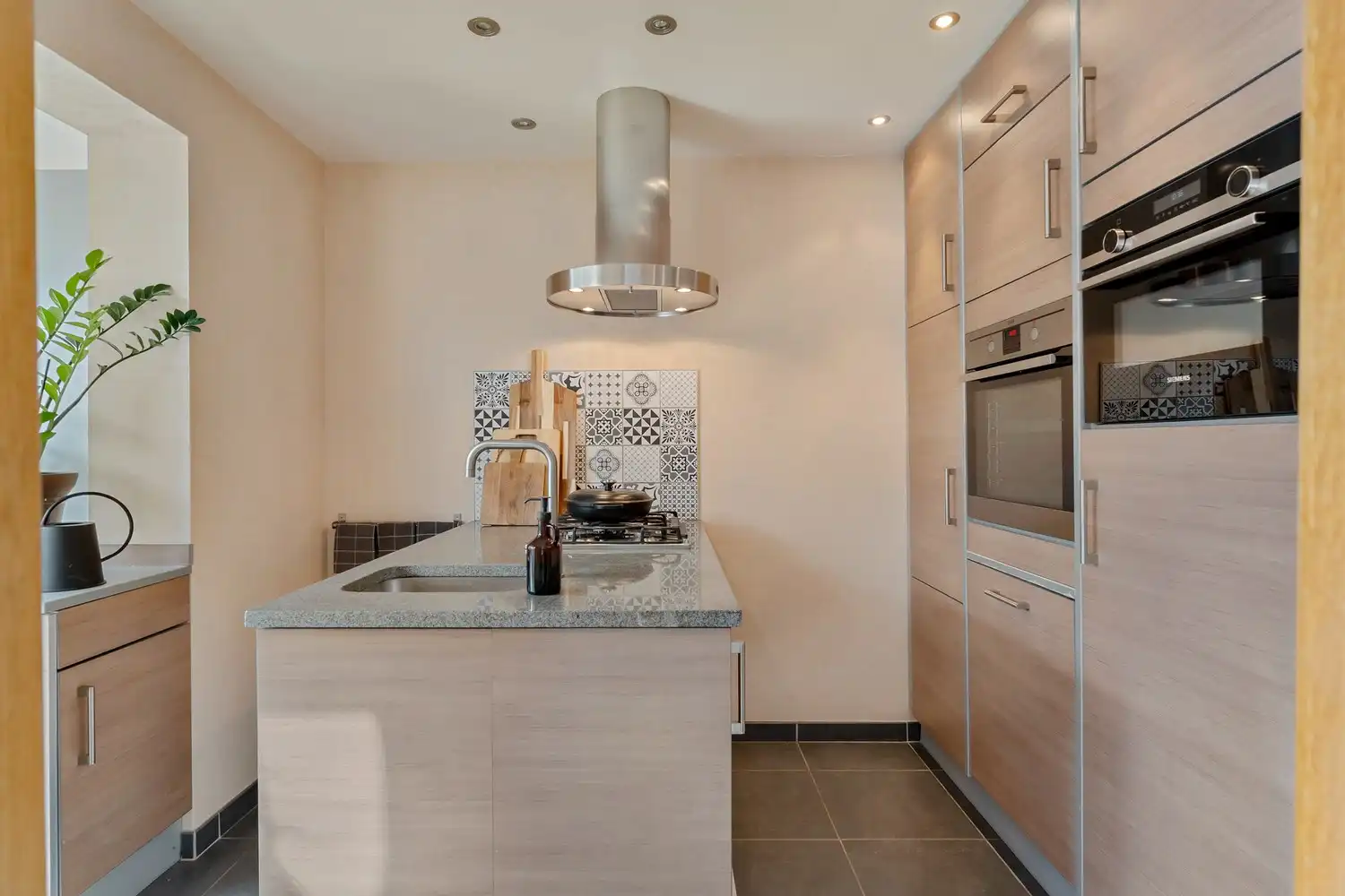 Goed gelegen woning met 4 slaapkamers, 2 badkamers, een garage met een autostaanplaats ervoor en een zuidwest georiënteerde tuin te Kessel-Lo! foto 22
