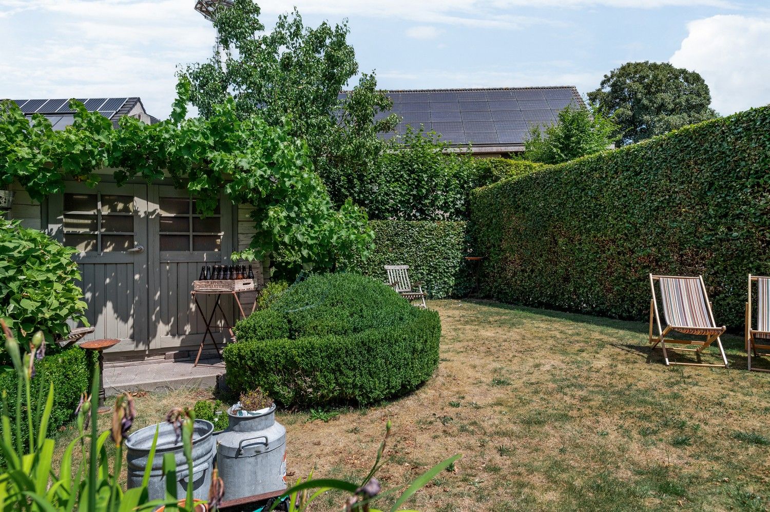 Prachtige woning met 3 ruime slaapkamers, inpandige garage met oprit, tuin & atelier! foto 8