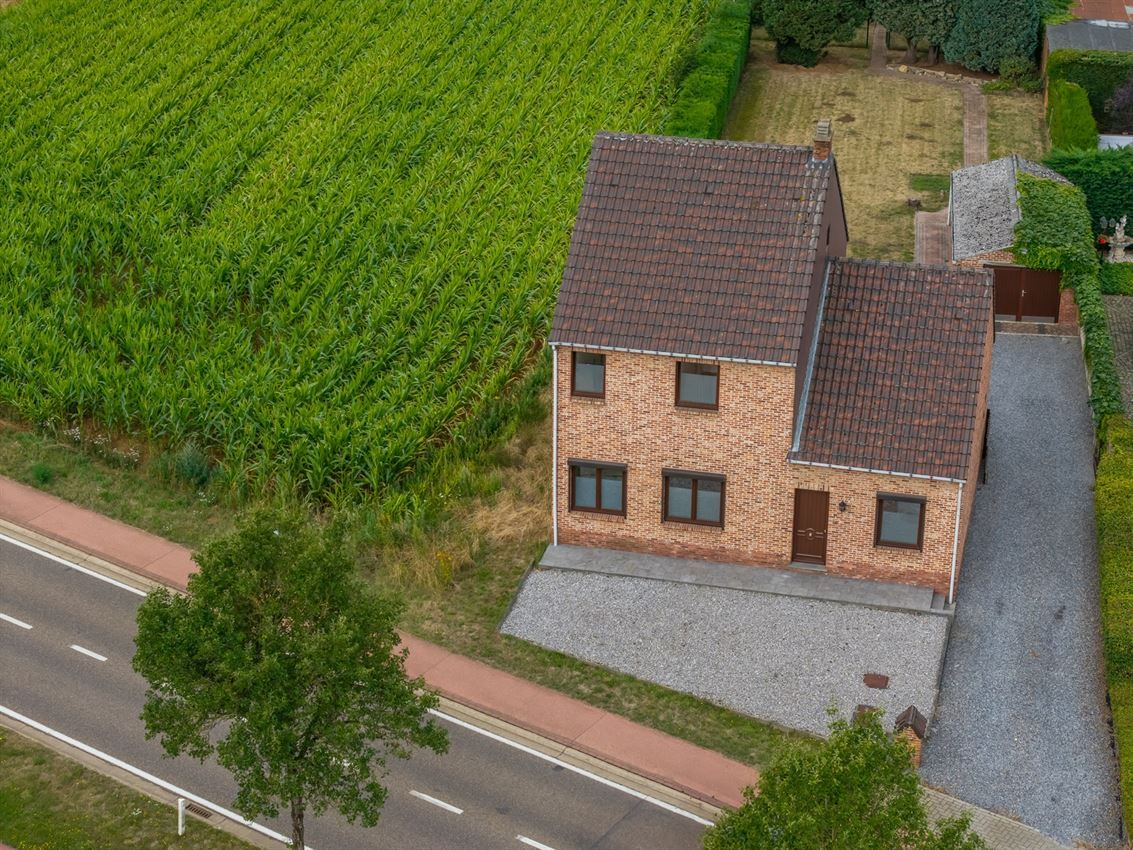 Vrijstaande woning met 3slk op 22a40ca op strategische ligging foto 40