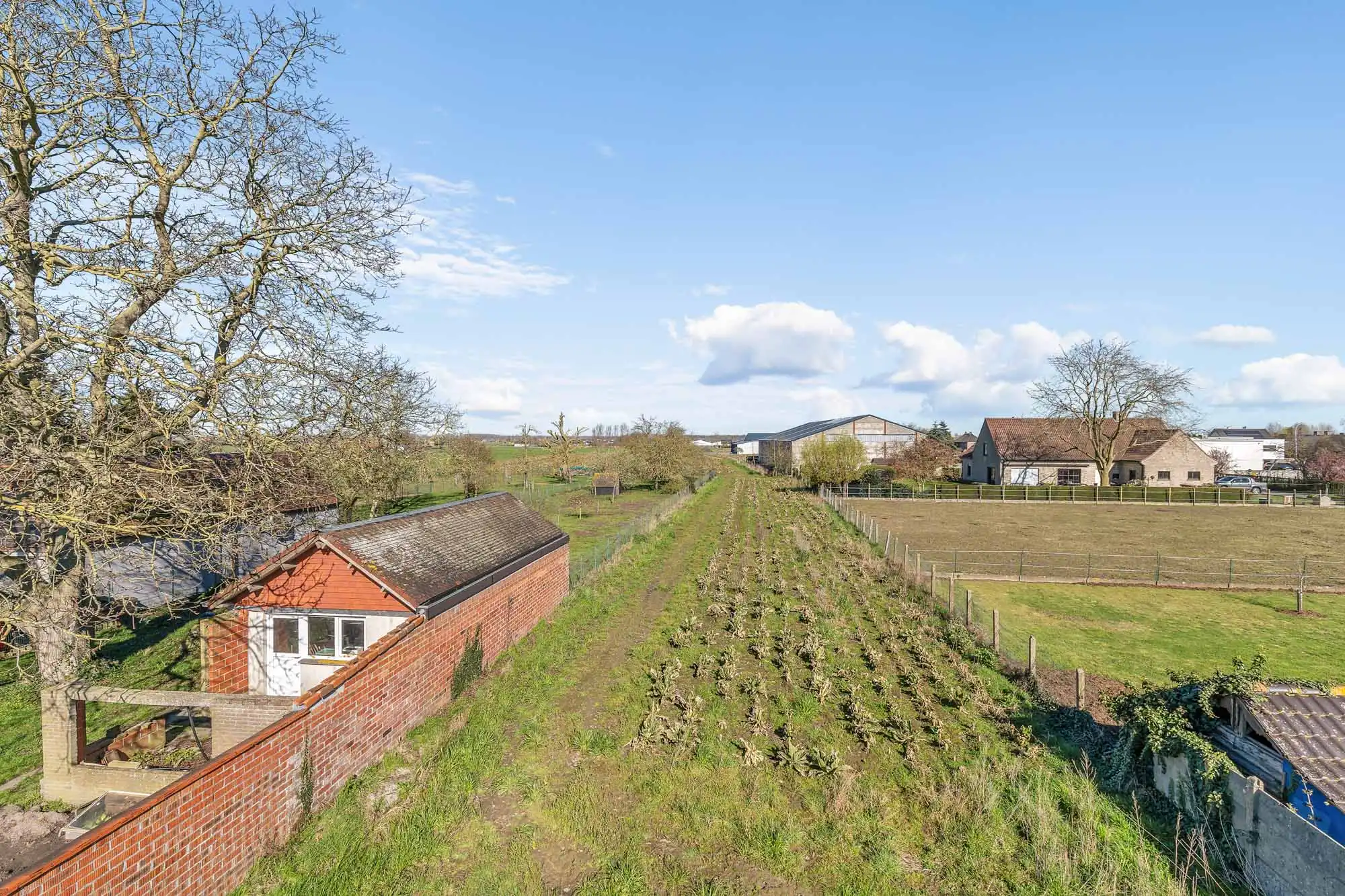 Bouwgrond met af te breken woning op toplocatie in Vinkt foto 5