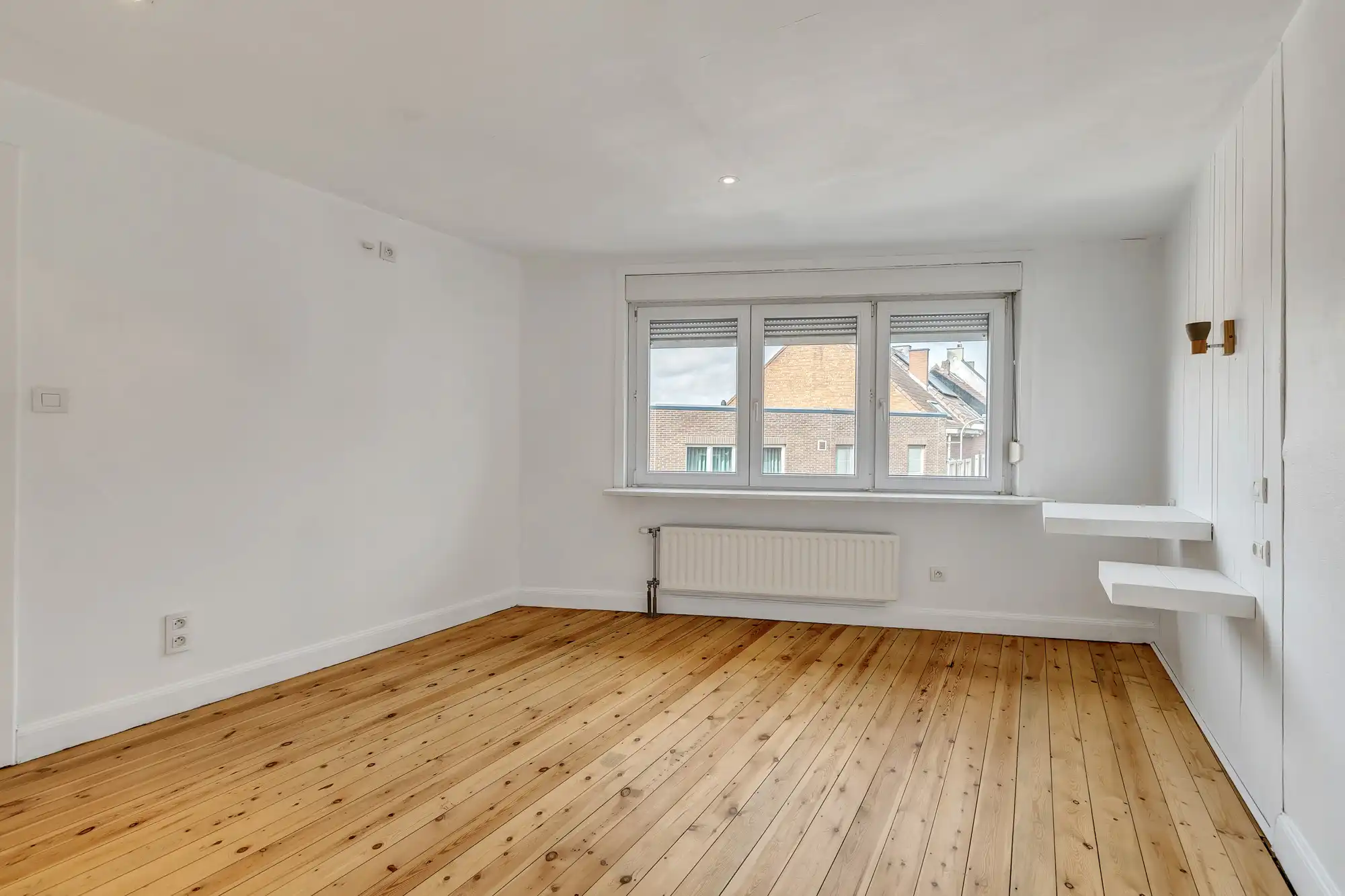 Instapklaar triplex of opbrengsteigendom met 4 slpks 2 badk foto 11