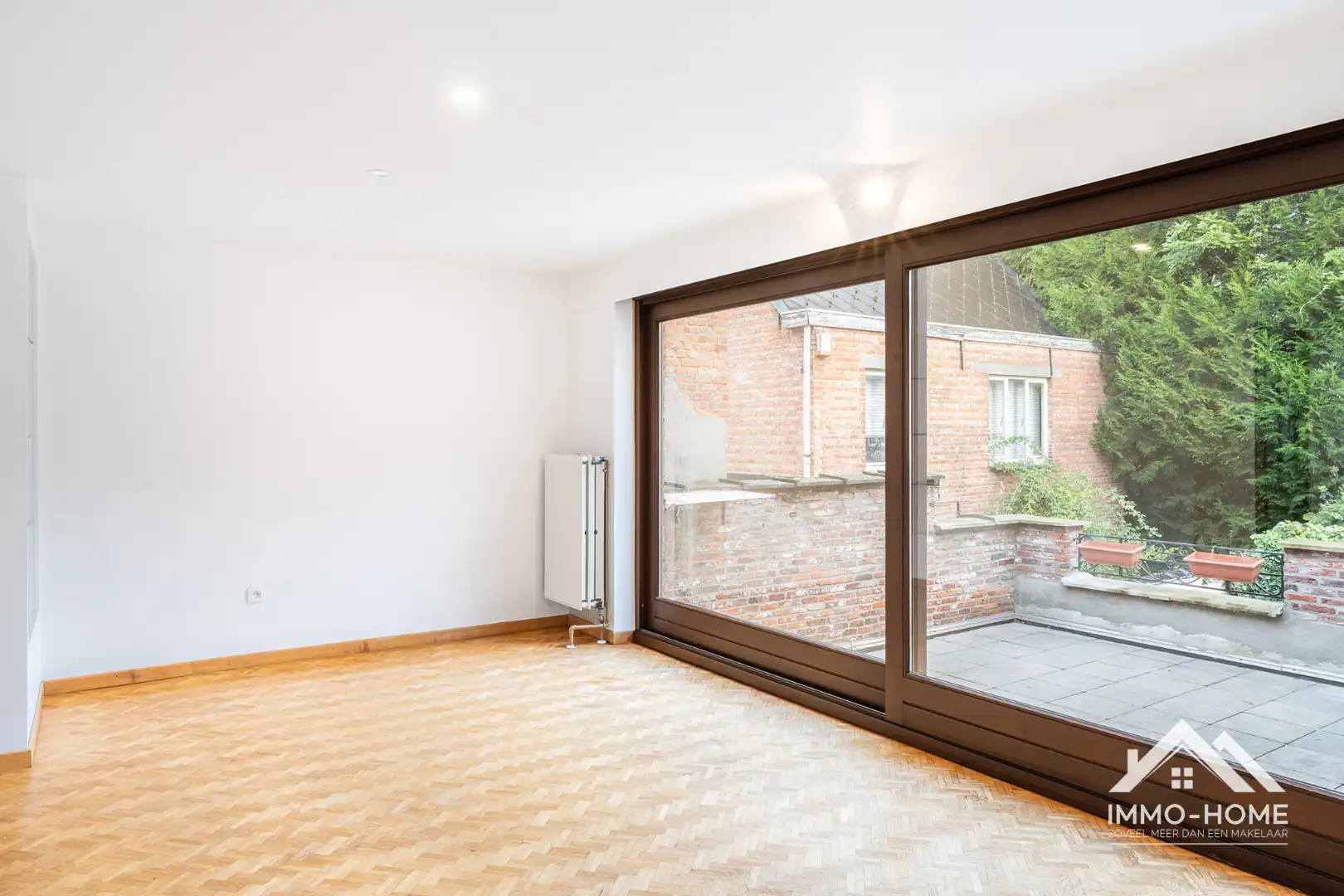 Instapklare duplex met ruim terras in hartje Lokeren foto 7