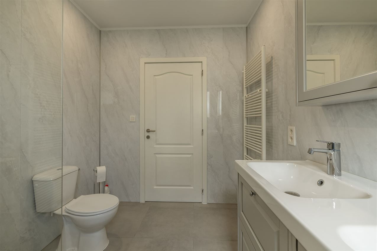 Gelijkvloers appartement, twee slpk., autostaanplaats foto 14