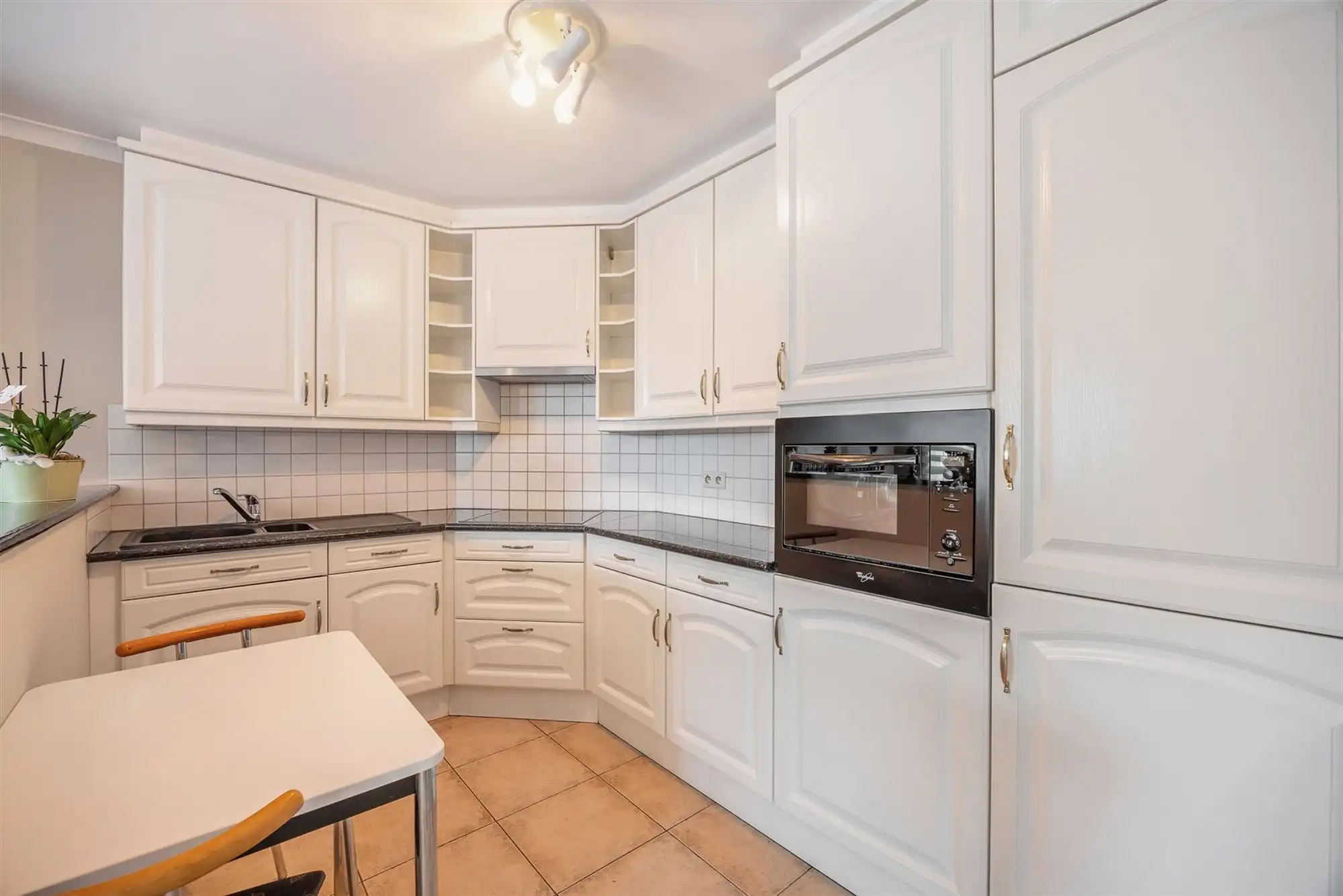 PERFECT ONDERHOUDEN APPARTEMENT MET 2 SLAAPKAMERS TE PAAL-DORP foto 9