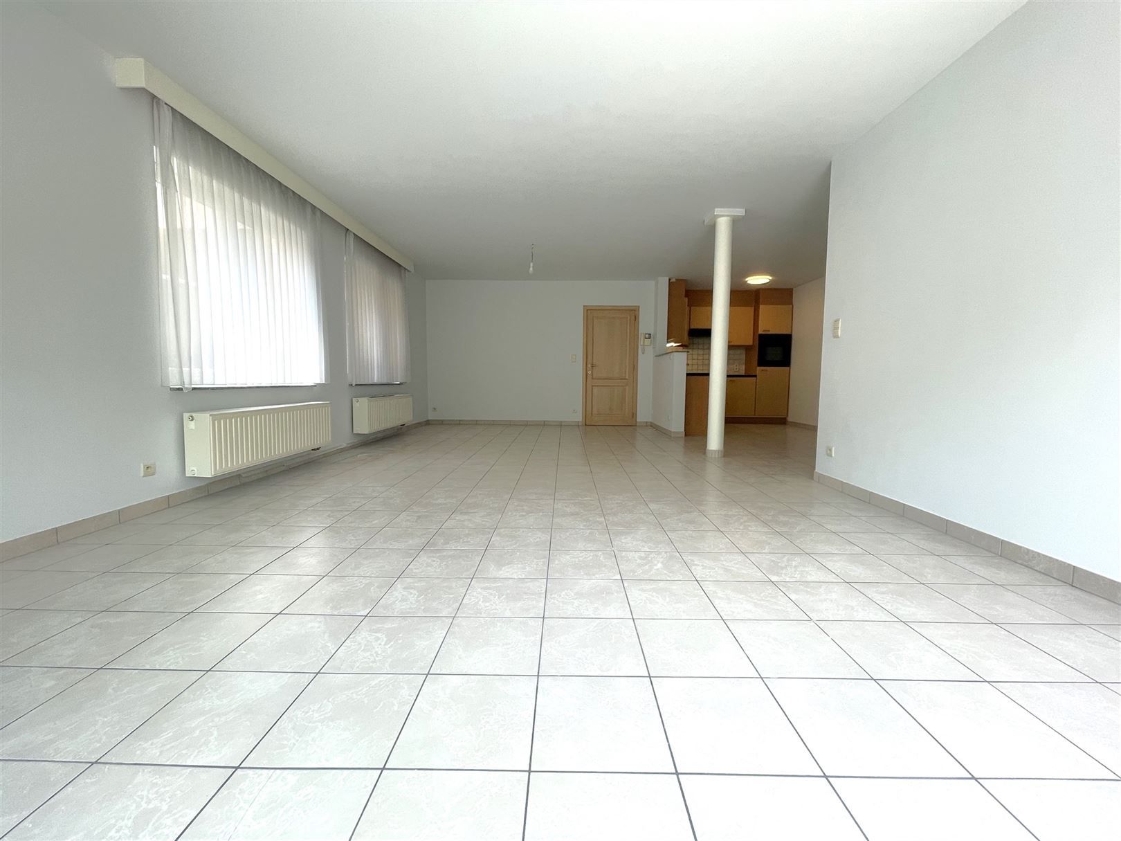 Gelijkvloerse appartement  met afgesloten koer  foto 3